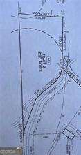 2.2 acres located in canton ga that's has been recently surveyed and ready to build. This would make a great Basment lot or a slab with some grading. There are no covenants or restrictions, Mobile homes welcomed! Well would need to be drilled. This peice of land is conveniently located off highway 108 in Canton GA. Close to shops, restaurants and Highway 20 to take you to 575 access or I-75!