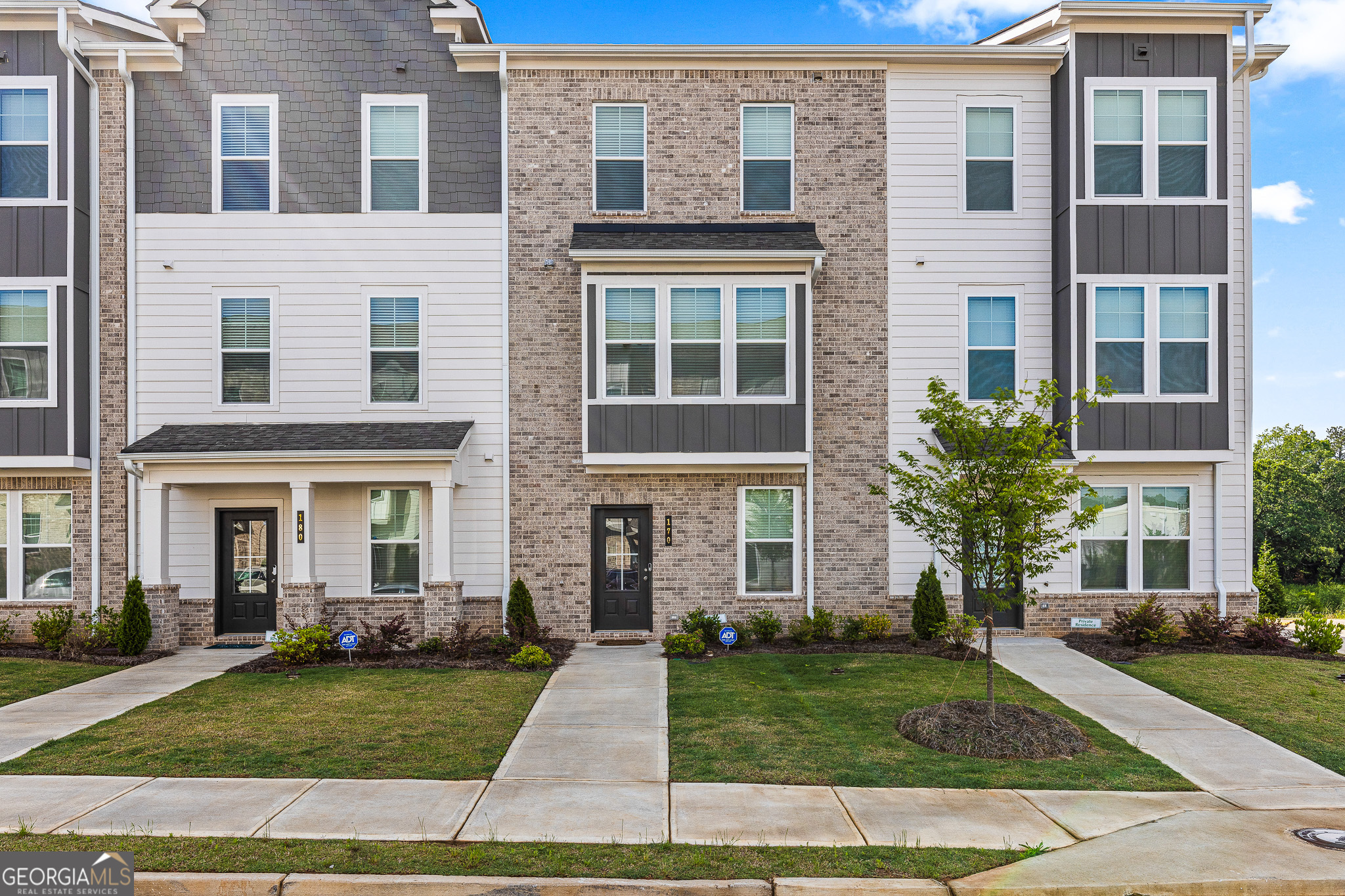 Available June 1. Lease this stunning nearly new construction home nestled in the heart of Fayette County, merely minutes away from the vibrant downtown for Fayetteville, GA. Indulge in the ease of low-maintenance living with this 3-story thoughtfully designed townhome, boasting 3 bedrooms, 2 full baths, 2 half baths, and a 2 car garage. This home showcases exquisite builder upgrades, reflecting a commitment to quality and sophistication. The chef's kitchen is a culinary enthusiast's dream, featuring a butler's pantry, gleaming white cabinets, and a stylish tile backsplash. The satin nickel finish on the fixtures adds a touch of elegance, creating a truly enchanting ambiance. With meticulous attention to detail, this property offers the perfect balance of functionality and style. Convenience is key, as this townhome is ideally positioned off Georgia 85, this stunning community offers a truly convenient lifestyle, with an array of dining and shopping. Piedmont wellness center, Fayetteville Pavilion, and Trilith Studios are just moments away with easy access to a variety of amenities. Trilith's Town Center hosts several outstanding businesses featuring chef driven restaurants, florist, bakery, autonomous grocer, home furnishings and plants! Newly renovated private Forest School, Guest House (boutique hotel collection) and Trilith Live featuring an entertainment complex, 2 live audience stages, auditorium and movie cinema. Come and experience the pinnacle of modern living at Satterfield, where comfort, style, and accessibility seamlessly converge.