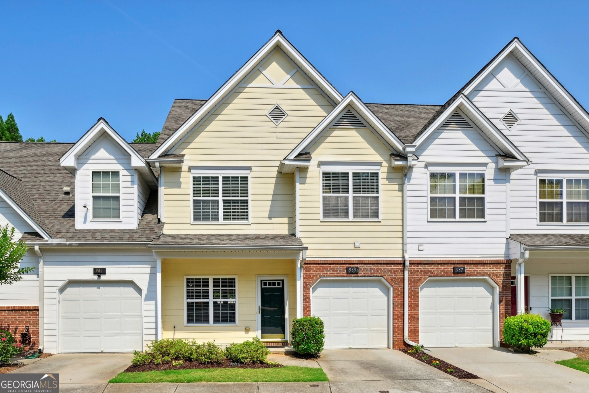 Welcome to Sugarloaf Forest. This sought after townhome community is offering one of the rarely available 3 bedroom plans. The home has been nicely updated with new LVP flooring on the main level, and new stainless appliances in the kitchen. And the heat pump and air exchanger is only 2-3 years old. The open concept floorplan connects the living room, dining room, kitchen, and the two-story fireside family room, perfectly suited for entertaining and daily living. Soaring ceilings continue upstairs in the vaulted primary suite, complete with walk-in closet, double vanity, garden tub and separate shower. A separate laundry room and two additional bedrooms that share a full bath on the hall complete the upstairs. To the rear of the house is a privacy fenced patio, a perfect spot for morning coffee or evening relaxation. So private, with no rear neighbors. This community is proud to offer low HOA fees and is located in the Grayson school district, and is super close to Alexander Park and to the YMCA. Shopping, restaurants, and entertainment are minutes away.