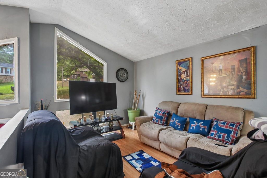 Photo of 6930 Smoke Ridge Drive, Fairburn, GA 30213 (MLS # 10765785)