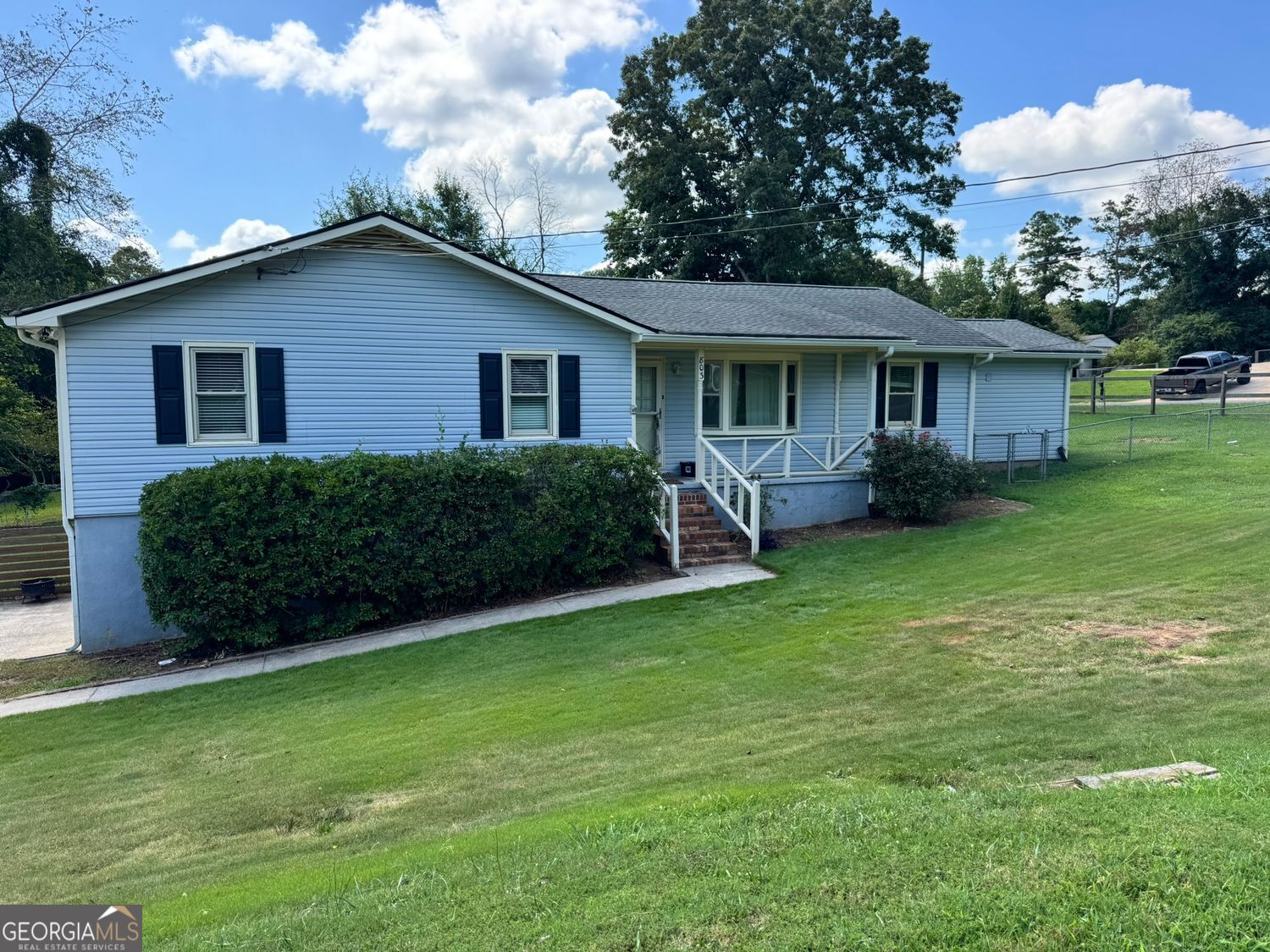New carpet and interior painting just completed. This move in ready home is super clean. Just minutes from Downtown Woodstock-one of the 'HOTTEST" new areas for shopping, nightlife, entertainment, and food. If you are looking for a master on the main ranch home with a large fenced yard, deck, Florida Room, Open floorplan, and a two car garage-YOU FOUND IT! Single story living with bonus unfinished basement. Nicely appointed kitchen and bath with granite tops, inviting front porch, recently upgraded HVAC and roof, and double pane windows for energy efficiency. Added room off the kitchen and deck perfect for entertaining. Easy access I-575 Express lanes, Marietta Square, Kennesaw, Canton, Roswell, and Alpharetta. No HOA. Move fast, this won't last.