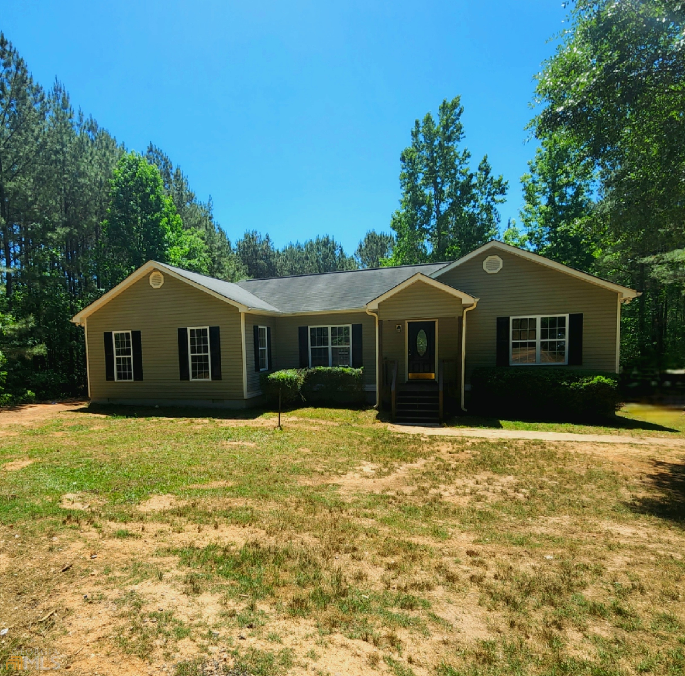 STUNNIG RANCH HOUSE ON 5 ACRES!!!! This house is a must -see with its charming arch way into the family room and curved corner details, large primary bedroom with on suite and walk in closet, NEW Stainless steel appliances ( no fridge), NEW Granite kitchen countertops, NEWLY Luxury Vinyl Plank flooring in common areas with NEW carpet in the bedrooms and Den not to mention the 2 BEAUTIFUL decks over looking the huge back yard are perfect for outdoor entertaining! Home also features BONUS storage in the large ATTIC, a long driveway for additional privacy and a cozy electric fireplace in the Den! Needless to say whatever your needs THIS HOUSE IS THE PLACE FOR YOU all while being just outside Athens and Minutes to Shopping and Restaurants!!!