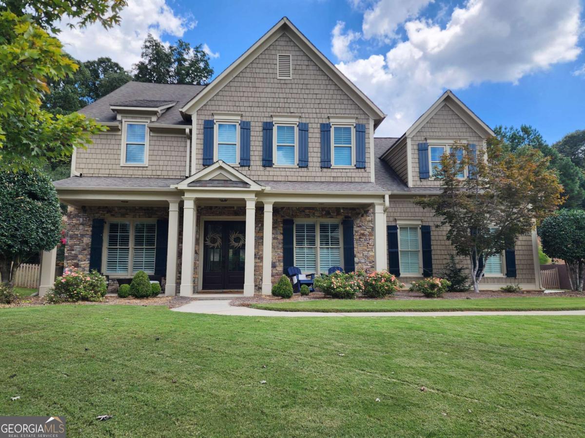 Welcome to Marietta's sought-after Hays Farm Community - Where Nature Meets Neighborhood Charm. Discover the perfect blend of comfort, convenience, and community in this beautifully upgraded 5-bedroom, 4.5-bath home. Designed with families in mind, this exceptional residence offers spacious living, thoughtful details, and access to the HOA swim/tennis amenities. Step inside to find a move-in ready home with bamboo flooring throughout and a versatile floor plan ideal for modern family living. A guest suite with full bath on the main level provides privacy and flexibility, while the oversized primary suite upstairs serves as a true retreat. Enjoy a generous 3-car garage and an entertainer's dream backyard - featuring a custom gas-start stone fire pit, a covered bar area with space for a large TV, and plenty of room to host summer BBQs or unwind with loved ones. But what truly sets this home apart is its incredible setting: just beyond your backyard lies direct access to the Kennesaw Mountain National Battlefield Park. Whether it's watching deer from your patio or enjoying nature hikes right outside your fence, this home brings the outdoors to your doorstep. Located just minutes from Marietta Square - with its vibrant dining, shopping, and year-round events - this home offers the best of both worlds: peaceful suburban living with unmatched convenience. Welcome home - your family's next chapter begins here. Pictures will be updated prior to going active on the market.
