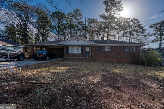 Discover this prime commercial property located at 3865 Story Dr, Marietta, perfect for growing or starting your business. This site is situated within the new Mableton city, close to Wellstar Hospital and the ongoing development of East West Connector corridor. The zoning allows for a variety of uses, including daycare, personal home, office, or professional building. The deep lot provides ample room for expansion, making it a versatile choice for your commercial needs. Don't miss the opportunity to secure a strategic location for your future endeavors!