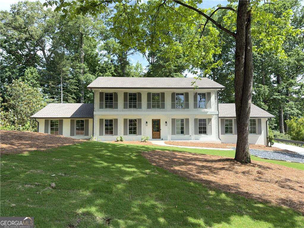 4.99% financing for qualified buyer with preferred lender! Complete renovation with modernized floorplan in the heart of desirable Oak Grove community (Briarcliff Woods East Neighborhood). Timeless Charleston inspired architecture. Freshly painted inside and out, new roof, gutters and downspouts. All new windows and doors, new driveway, new garage, new mechanicals, new vaulted covered porch with stained wood ceiling and composite flooring, all new bathrooms, new hardwood flooring on both main and upper level. New kitchen (open to family room) with classic professional 48" Wolf range, center island, walk in pantry, adjacent mudroom and full size laundry with sink. 2-story entry foyer with adjacent powder room. En-suite guest room on main. Large primary suite up with oversized walk in shower, double vanity, walk in closet and custom millwork cabinetry.. Two additional bedrooms up. Spray foamed attic. Newly sodded front yard. Chipped slate parking area with granite border. Huge FULL unfinished walkout basement with fireplace for future expansion.