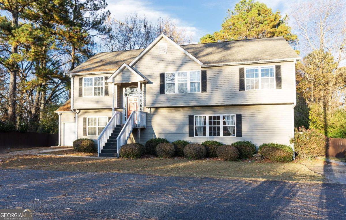 This beautifully designed, fully furnished home blends modern style with spacious functionality. It offers two complete kitchensCoone on each levelComaking it perfect for multi-generational living. The upper level features 3 bedrooms and 2 full bathrooms, while the main level includes 2 bedrooms and 1 full bathroom. Additional highlights include a one-car garage, a screened-in sunroom, a fenced backyard ideal for outdoor enjoyment, and a dedicated tool room for extra storage or hobbies. Conveniently located near I-75, this home is just 9 minutes from Marietta Square, 12 minutes from Truist Park and Cumberland Mall, 20 minutes from Midtown/Downtown Atlanta, and 35 minutes from Hartsfield-Jackson Atlanta International AirportCooffering the perfect balance of comfort and accessibility. This fully furnished home includes everything you needCojust bring your luggage and move right in!
