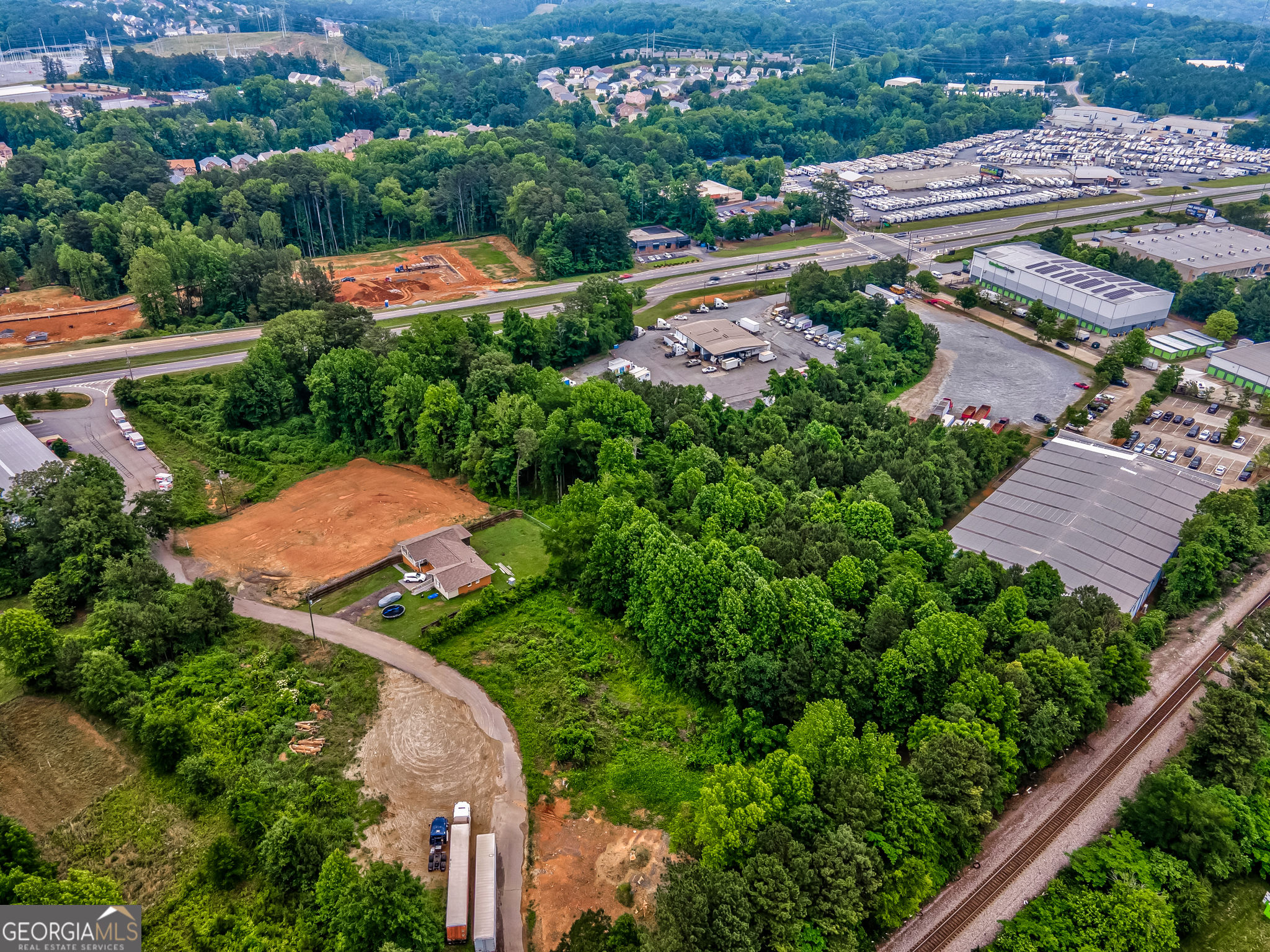 These are two adjoining lots- 1394 Asberry Dr, NW and 0 Cobb Pkwy in Marietta. Vacant lots, no structures. Combined acreage of 2.8 acres. Parcels 16086600130 and 16086600190