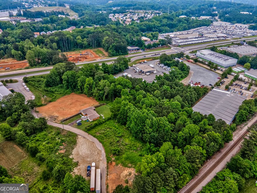 These are two adjoining lots- 1394 Asberry Dr, NW and 0 Cobb Pkwy in Marietta. Vacant lots, no structures. Combined acreage of 2.8 acres.   Parcels 16086600130 and 16086600190