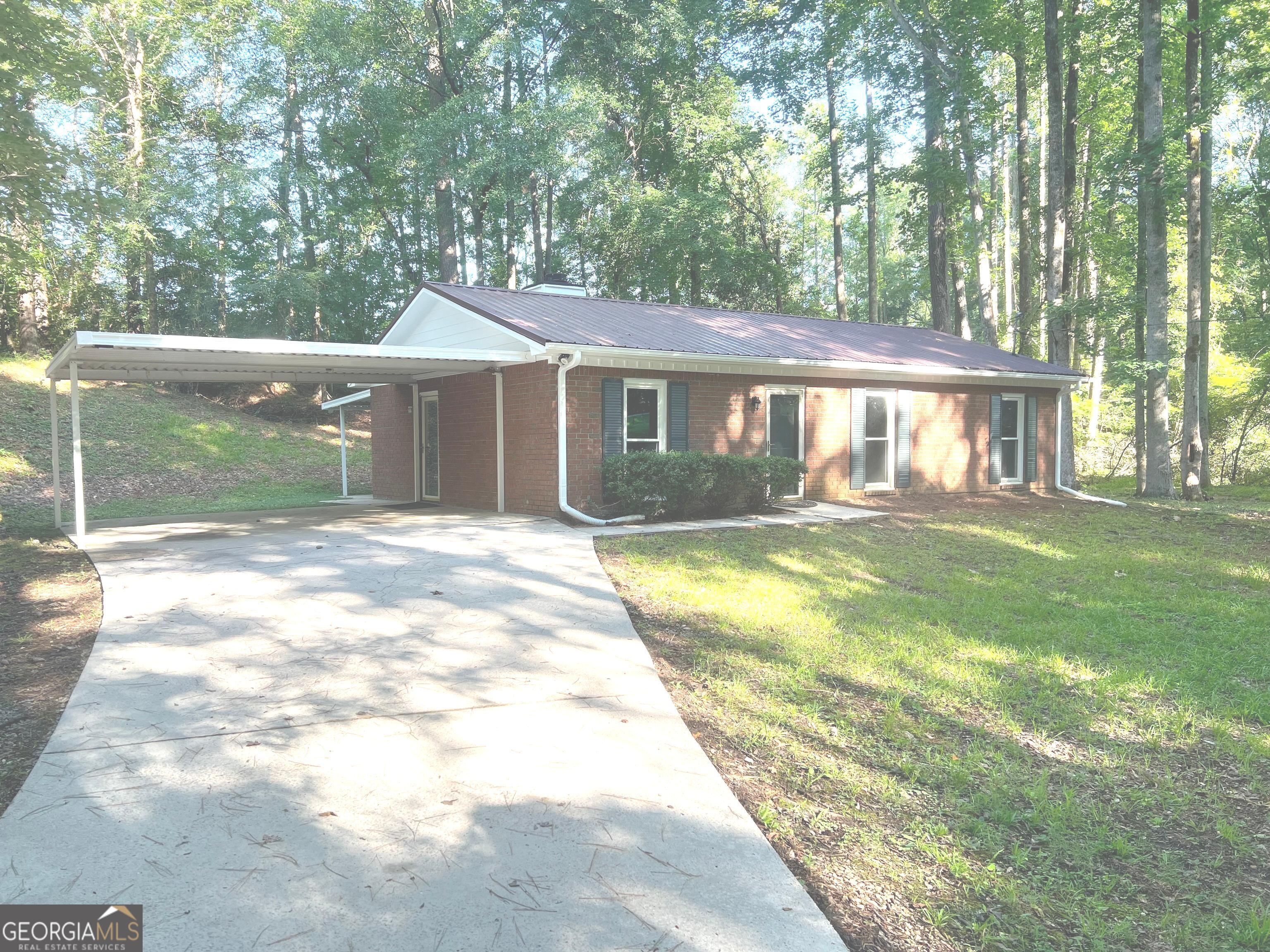 low maintenance home 3 bed rm 2 bath with metal carport shed all brick with upgraded new stove and dishwasher. metal roof We are now accepting FHA contracts This property is investors owned No disclosure statement