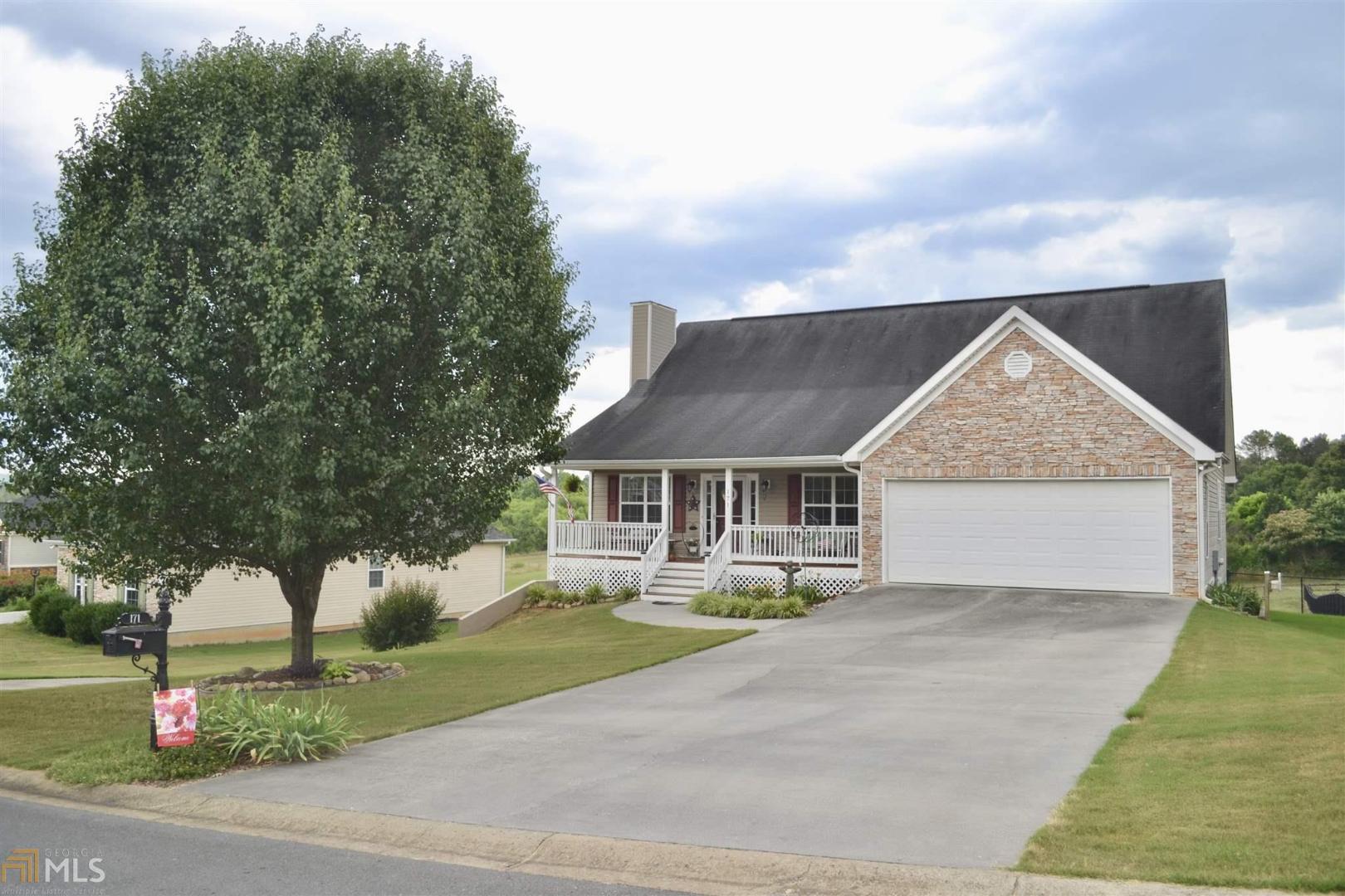 Look no further. This Ranch over a large daylight basement is the perfect home. Sitting on almost one acre this beautiful house is just a short drive to I-75 and US Hwy. 41. Home features a back deck, hardwood flooring, a side garage/workshop, and a finished basement.