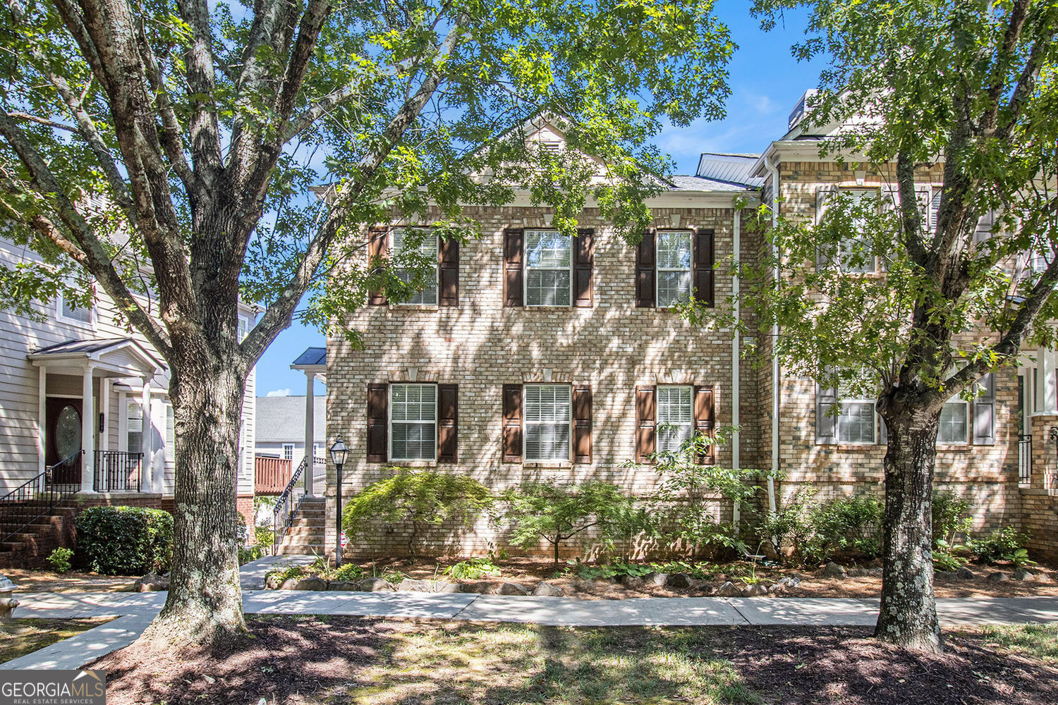 Prime Corner Lot near Downtown Suwanee - North Gwinnett School District! Welcome to this stunning home perfectly positioned in one of the most sought-after locations - the award-winning North Gwinnett School District and just minutes from vibrant Downtown Suwanee! Nestled on a desirable corner lot, this home combines unbeatable convenience with stylish comfort. Step inside to a spacious open-concept layout, featuring a gourmet kitchen with granite countertops, modern lighting, and seamless flow into the main living and dining areas - perfect for entertaining or everyday living. The in-law suite on the main level offers a full bathroom, providing comfort and flexibility for guests or extended family. Upstairs, you'll find a versatile loft ideal for a media room, home office, or game night central. The primary suite is a true retreat, boasting a luxurious en-suite bath and a walk-in closet big enough to impress even the most dedicated fashion lover. Need more space? The finished basement includes a bedroom, perfect for a teen suite, home gym, or private guest area. Don't miss this opportunity to own a home with it all - top schools, walkability to Suwanee's best shops and restaurants, and a layout that fits every lifestyle.