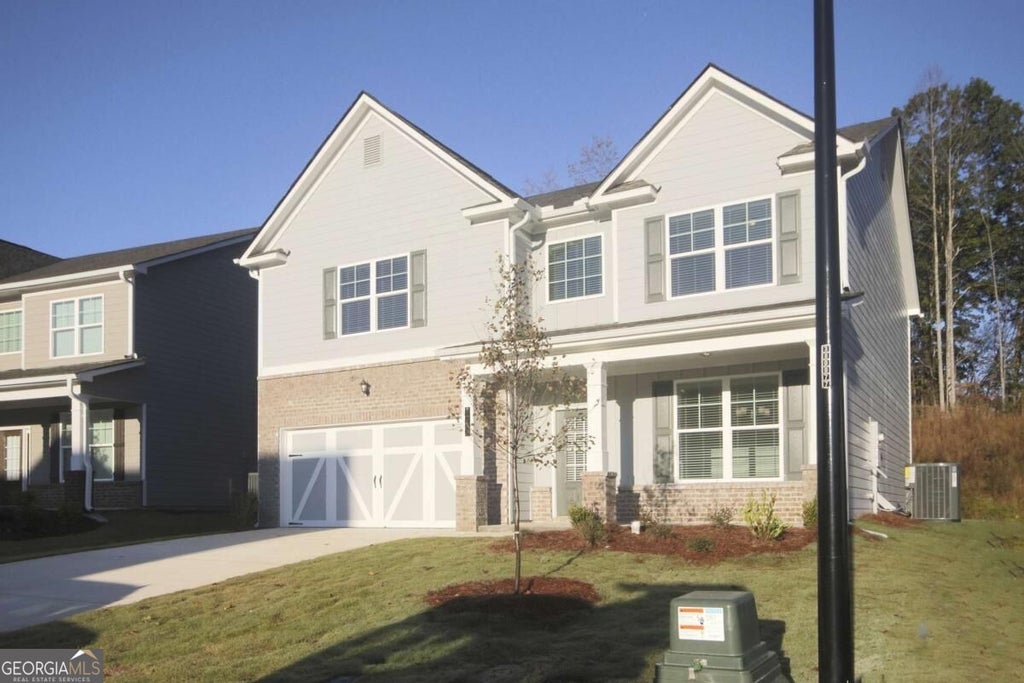 Photo of 7424 Rocklin Lane, Flowery Branch, GA 30542 (MLS # 10840916)