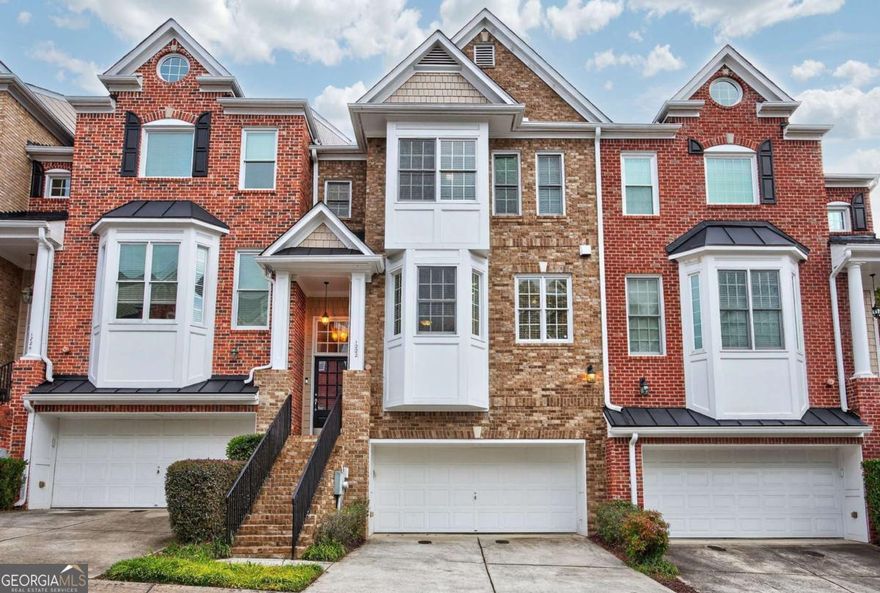 Move-In Ready, Renovated Townhome in Smyrna! Direct Access to Silver Comet Trail!   Welcome to 1222 Creekside Place - where lifestyle, location, and luxury meet!  Nestled in one of Smyrna's most sought-after communities, this beautifully 3 bedroom, 3.5 bath townhome offers the ideal blend of modern comfort and outdoor access.     The open-concept main level features elevated ceilings, hardwood floors, and a cozy fireside living room filled with natural light while the eat-in kitchen impresses with stainless steel appliances and a cozy kitchen island.    Upstairs, the primary suite feels like a retreat with tray ceilings, a walk-in closet, and a spa-style bath with double vanities, a soaking tub, and a separate shower. Two additional bedrooms and a full bath complete the upper level, offering plenty of space for family or guests.    The finished terrace/basement level includes a full bedroom, full bath and flexible living area perfect for office, gym, or media room. A 2-car garage and low-maintenance living make this home as practical as it is beautiful.    End your day poolside at the community pool or relax on your private deck surrounded by nature.    With no rental restrictions, this property is also an excellent opportunity for investors or first time home buyers. Located minutes from The Battery, Truist Park, Smyrna Market Village, and major highways (I-285 & I-75), you'll enjoy easy access to shopping, dining, and entertainment.       Don't miss your opportunity to own this rare gem with trail-front living - schedule your private showing today!    Also available for rent for $2900/month