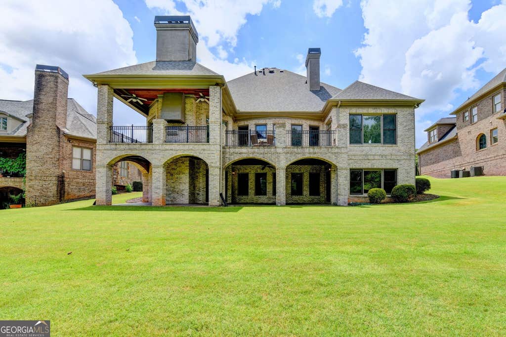Photo of 8330 Royal Melbourne Way, Duluth, GA 30097 (MLS # 10823850)