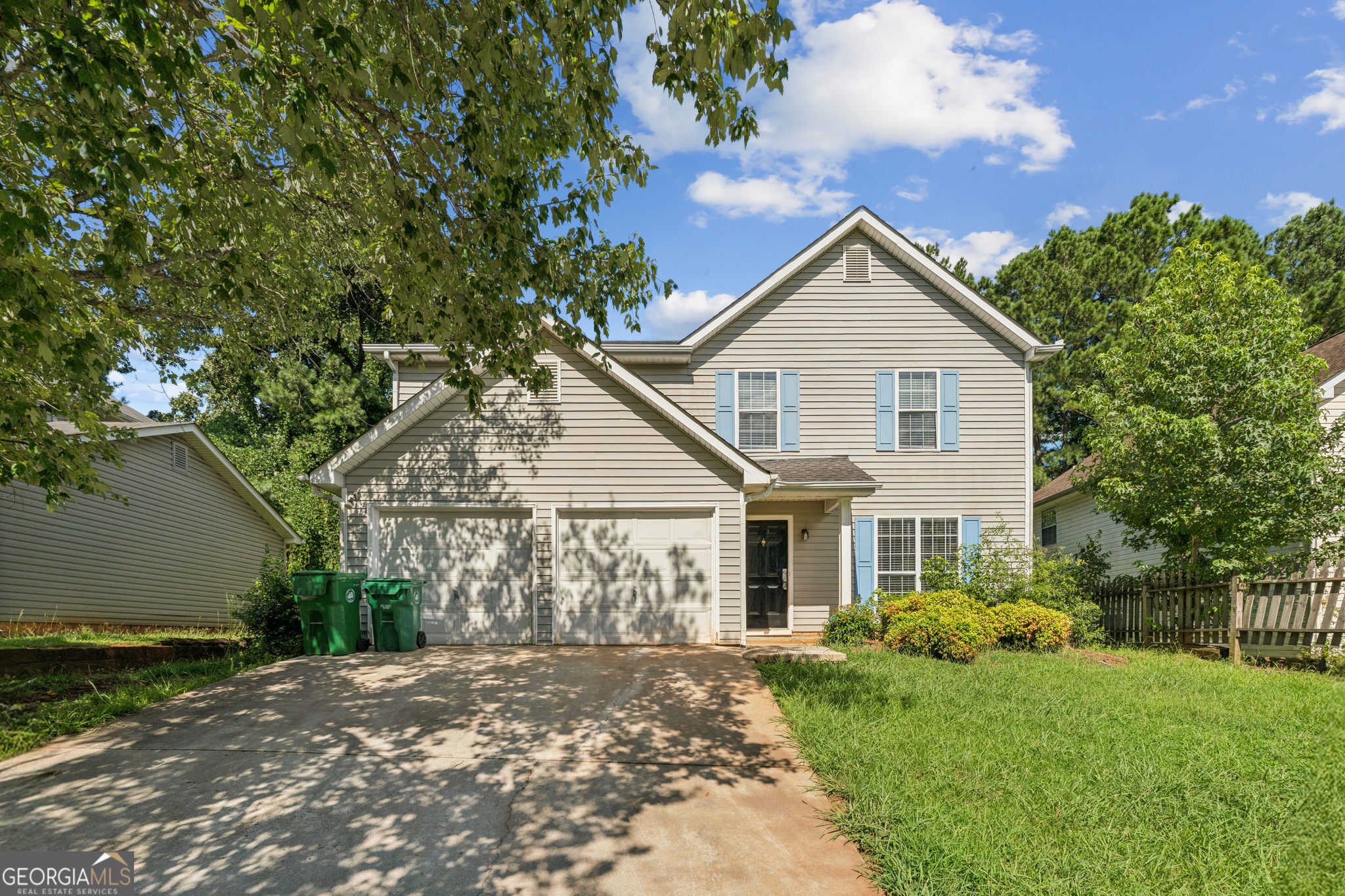 This spacious two-story home features 3 bedrooms, 2.5 bathrooms, and a bright, open layout. Highlights include a cozy fireplace, tray ceilings, walk-in closet, and a well-equipped kitchen with a dishwasher and microwave. With central air, mixed flooring, and an in-hall laundry area, the home offers both comfort and convenience in a quiet Decatur neighborhood.