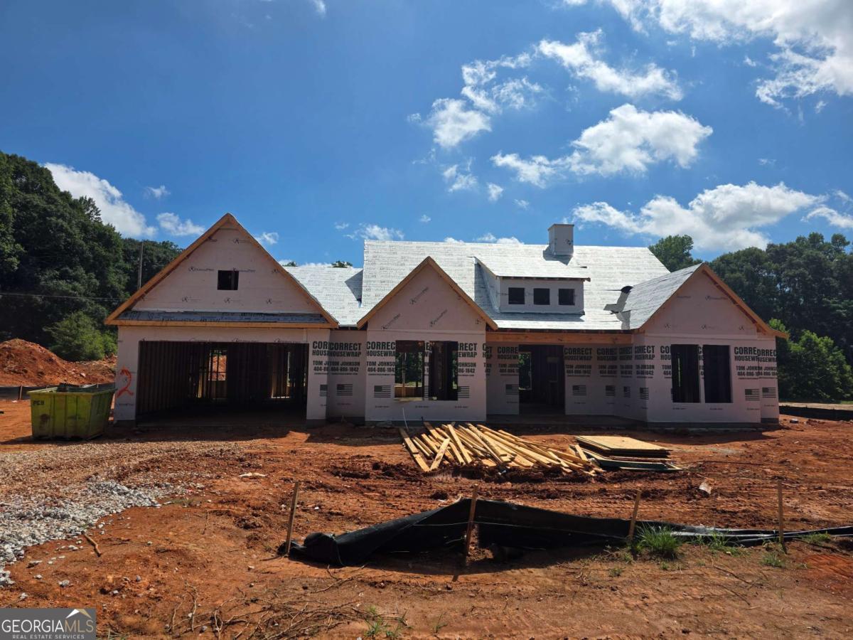 ALL NEW PLANS ON ESTATE SIZED LOTS! WHERE UPGRADES COME STANDARD AND PEOPLE COME FIRST! This true RANCH MASTER ON MAIN plan is one of a kind. Featuring double front doors, tall ceilings, tons of light, gourmet kitchen with island, builtin oven/microwave and venthood to exterior. HUGE oversized walk in pantry with windows, secondary bedrooms with jack and jill bathroom and private single bedroom suite. Owners suite with trey ceiling, bath with freestanding soaking tub, walk in tile shower, separate vanities. Covered back porch nestled and overlooks the hardwoods at the rear of the property where the creek is. At Madison Oaks, we value relationships over transactions. Three partners, one shared vision. It's not just about building houses, it's about building trust. Madison Oaks is where people come first. Discover all-new plans, thoughtfully crafted with hard-to-find features that others call upgrades, but here, they come standard. Nestled among mature hardwood trees, Madison Oaks offers space to breathe, timeless design, and a lifestyle that feels like a retreat every day. Whether it's a friendly game on the neighborhood pickleball court, a walk through tree-lined streets, or entertaining at home, Madison Oaks delivers that next level of living space, style, and value in one. This isn't just a move. It's your next step into a smarter investment, a lasting legacy, and a home you'll be proud to call your own. HURRY some selections are still able to be made! ASK ABOUT GRAND OPENING BUILDER INCENTIVES and Rates that can be as low as 5%. Built By: Homelife Communities