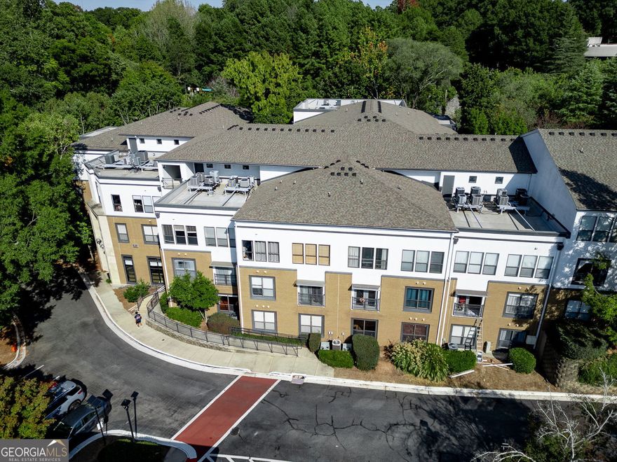 Perfect Intown Condo on the Beltline! Beautifully renovated 2 bedroom end unit in the highly sought-after Freedom Lofts, just steps from the Eastside Trail. Enjoy secured entry access, gated parking, and a vibrant intown lifestyle! This bright, light-filled home  features hardwood floors, neutral paint, stainless steel appliances, white shaker cabinets with updated hardware, granite countertops, and modern lighting throughout. The open-concept kitchen with counter-height seating flows seamlessly into the spacious living area ideal for entertaining or relaxing. Both bedrooms offer generous  natural light, and the newly renovated bathroom includes a large, beautifully tiled shower. Additional features include an in-unit laundry closet with side-by-side washer and dryer and 2 Deeded Parking Spaces in the onsite deck, plus EV charging stations. Freedom Lofts offers fantastic amenities, a community pool, fitness center, club room, dog run, Google Fiber, and a tranquil courtyard. Unbeatable location: Walk or Bike to Ponce City Market, Krog Street Market, Old Fourth Ward Park, and the Poncey-Highland shops and restaurants. Live your best Atlanta life with direct Beltline access, surrounded by the city's best dining, shopping, and nightlife. Don't miss this rare  opportunity in one of Atlanta's most desirable communities!