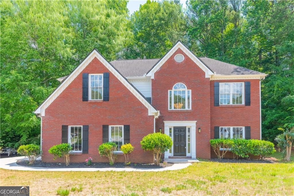 Photo of 4595 Riders Ridge Trail, Snellville, GA 30039 (MLS # 10769405)