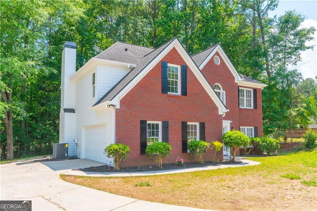 Photo of 4595 Riders Ridge Trail, Snellville, GA 30039 (MLS # 10769405)