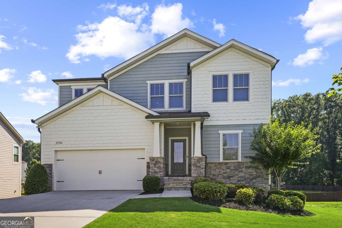 Welcome to your dream home in Cumming! Nestled on a peaceful cul-de-sac in a quiet, highly sought-after community, this stunning 4-bedroom, 3.5-bath Colonial offers the perfect blend of modern comfort and timeless charm-just minutes from downtown Cumming and the vibrant Cumming City Center. Built in 2019 and thoughtfully updated, this 2,800 sq ft home boasts an open-concept layout with hardwood floors throughout the main level, soaring ceilings, and abundant natural light. The heart of the home is a designer-inspired white kitchen, featuring a large center island, sleek countertops, stainless steel energy-efficient appliances, and ample storage-ideal for both everyday living and entertaining. Flowing seamlessly from the kitchen, the spacious dining area and inviting great room are anchored by a cozy gas fireplace, creating a warm and welcoming atmosphere. Step outside to a private, landscaped backyard with a generous deck-perfect for morning coffee or evening gatherings. Upstairs, retreat to the luxurious primary suite with a spa-inspired bath and generous closet space. Three additional bedrooms offer comfort and flexibility for guests, family, or a home office. All 3.5 bathrooms are beautifully updated and supported by a Rinnai tankless water heater, providing endless hot water for busy mornings and relaxing nights. This home also comes equipped with a premium ADT security system, including sensors on all doors and windows plus a centrally monitored alarm system-giving you peace of mind from day one. Located just minutes from top-rated schools, shopping, dining, parks, and commuter routes, this move-in-ready gem offers the best of suburban living with unbeatable convenience. Don't miss your opportunity to call this exceptional property home!