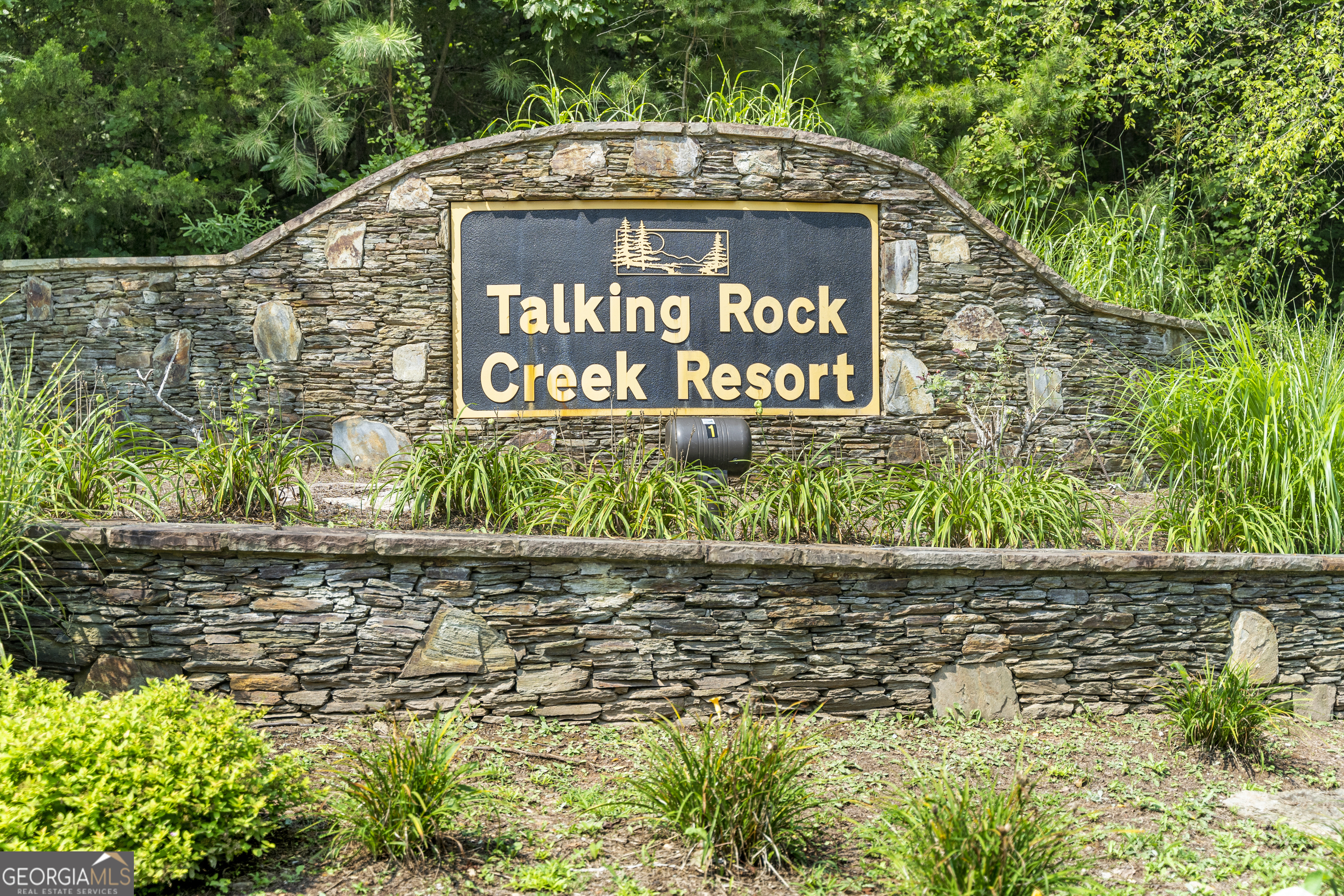 Privacy with a sense of community is an understatement in the best kept secret in North Georgia. Talking Rock Creek Resort consists of 5,000+ acres, sitting gracefully only an hour from Atlanta, Chattanooga, minutes to Blue Ridge and right across from Carters Lake. Here you will find 122+ miles of roads to explore, 2 pools, private stocked lake, 2 tennis courts, basketball, fitness center, clubhouses, a chapel, 3 gated entries, security and a one of a kind private creek beach located at The Trout Lodge. You may find on some days you will see more deer, turkey, the elusive fox, occasional bear or community peacock than you may see people! TRCR is perfectly situated within minutes to multiple hiking trails, rivers, biking trails, vineyards, orchards, shopping and so much more! Life is a little more laid back and quieter in the 706 area code, come see what the 706 Life is about and why so many chose to call Talking Rock Creek Resort HOME!