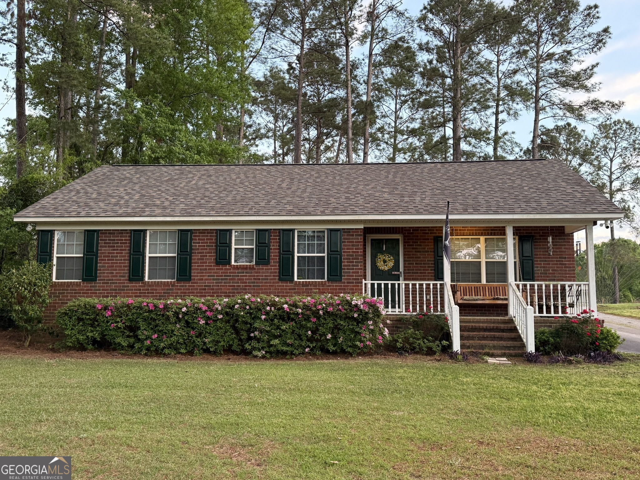 Charming Brick Home with Workshop. This well-maintained home blends comfort and functionality. The Spacious master suite features a separate shower and an oversized jacuzzi tub for a true retreat. The large, updated kitchen and open dining area is perfect for gatherings while the generous family room offers plenty of space to relax. Out back the powered workshop with double garage doors and a carport provides room for Hobbies, storage or projects. Solid construction, smart updates and versatile spaces make this property ready for its next chapter.