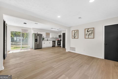 Photo of 8878 Burnham Way, Jonesboro, GA 30238 (MLS # 10761357)