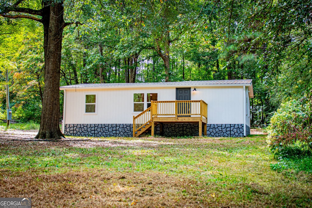 Photo of 77 Rock Springs Lake Drive, Carrollton, GA 30116 (MLS # 10870796)