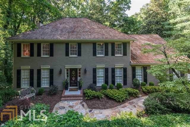 This exquisite 6 bedroom, Brick Georgian is a Head-Turning Knock-Out! Meticulously maintained featuring $150,00o+ in recent renovations, including: ALL NEW - Gutted & Expanded Granite & Stainless Island Kitchen w/ copious cabinets; ALL baths remodeled; Brand New Multi-Level deck. Immense Sun Room Add-On, & a $60k+ Kid Cave. Located in the HEART of the Sandy Springs Park District & Nestled on a private, fully fenced & protected Half Acre lot featuring 2 large flat play areas PLUS a rear gate accessing the best Cul-de-Sac in Sandy Springs.