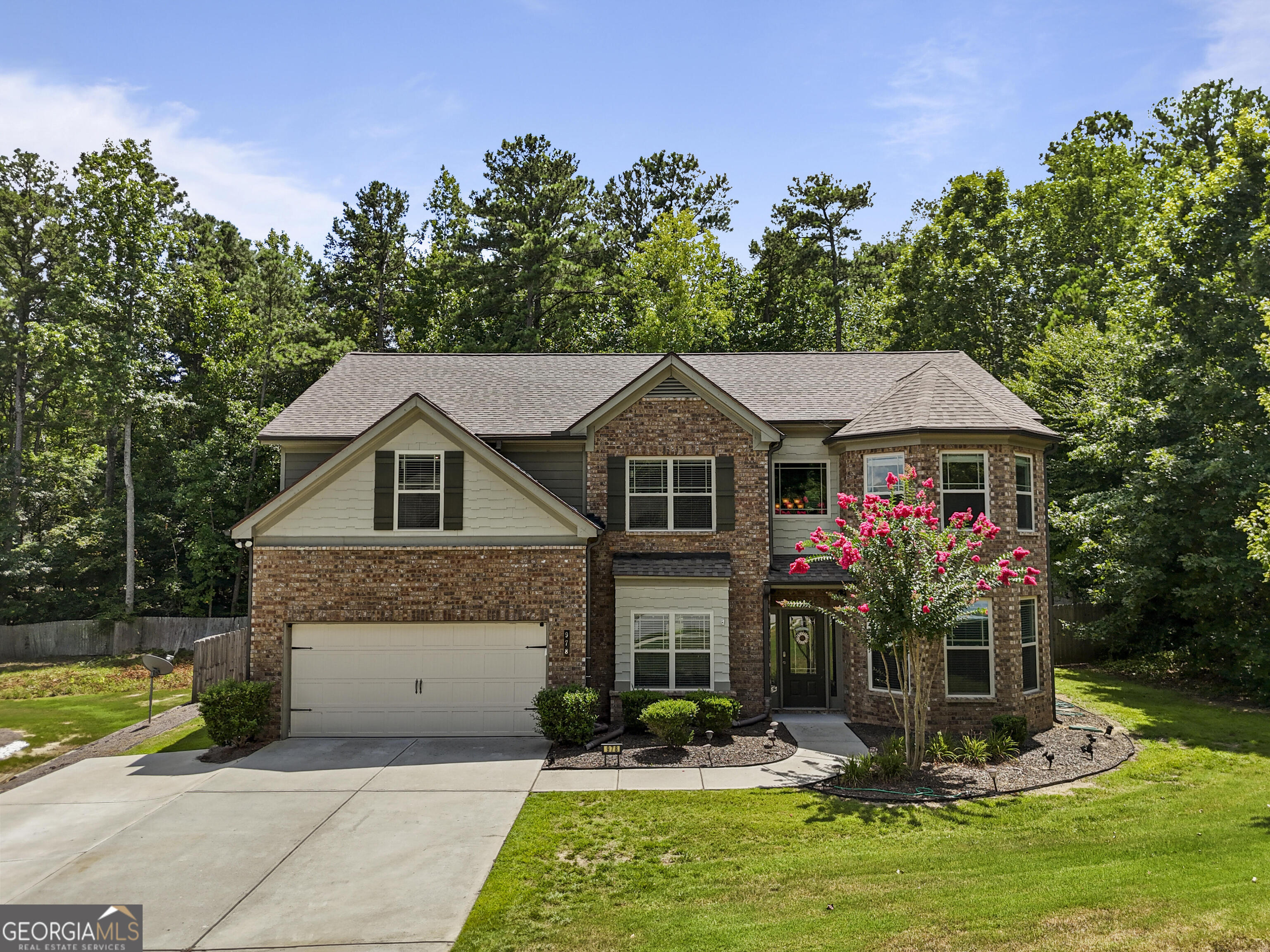 This spacious 5-bedroom, 3-bath home in Dacula is listed at $549,000-nearly $200K below the Zestimate. With over 3,200 sq ft, it features a bright open layout, marble fireplace, and modern kitchen with tons of cabinet space. Built in 2016, it's clean and move-in ready, with room to personalize. The large backyard is great for relaxing or entertaining, and the location is close to shopping, dining, and parks. Similar homes have sold for up to $560K-this one offers more space and better value.