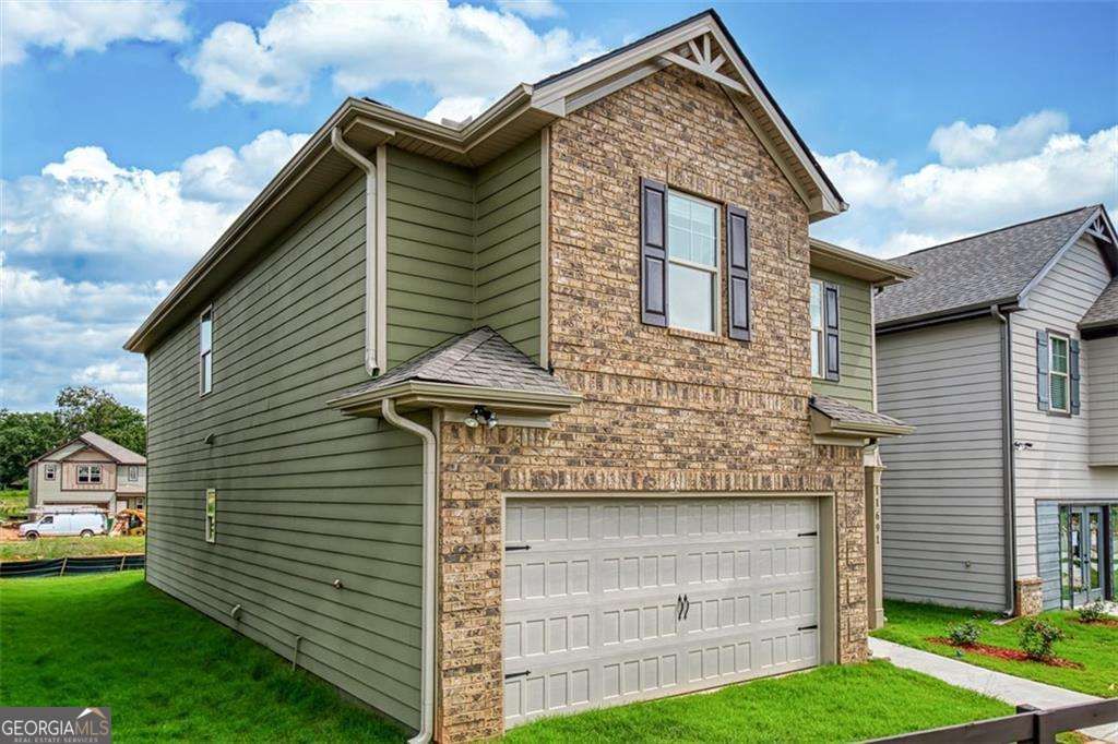 Photo of 40 Freebia Walk, Covington, GA 30016 (MLS # 10659648)