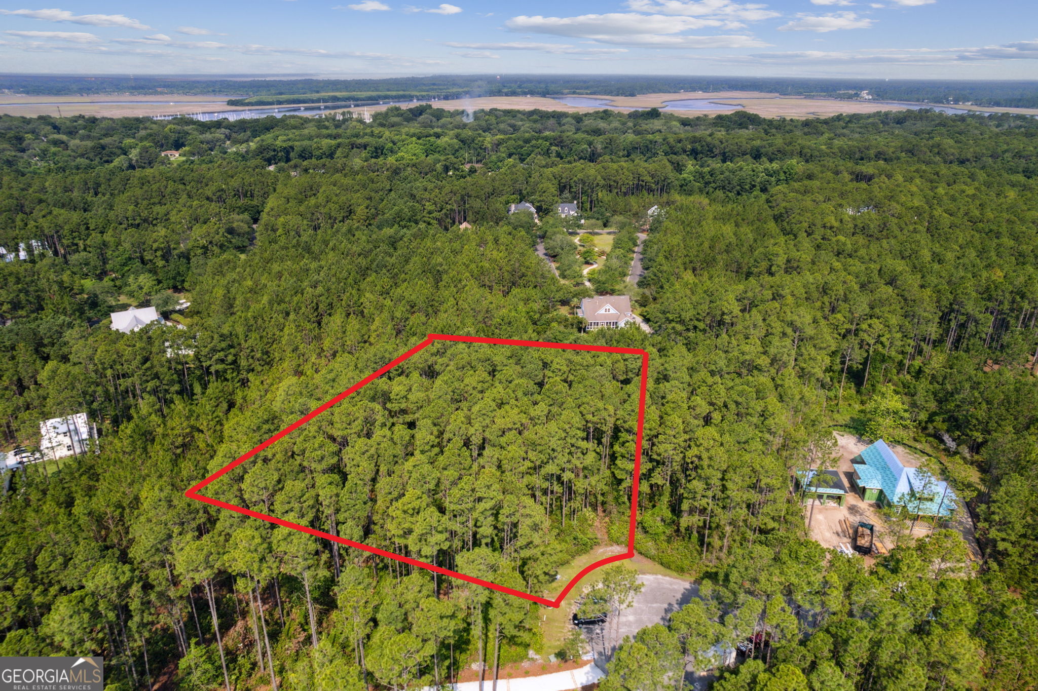 This is one of just a few homesites in Cumberland Harbour, on almost an acre of land. Situated in a cul-de-sac with lush pine trees that add to your privacy. Call today for an appointment to see where your dream home can be. This is a gated community and will require a licensed agent for access