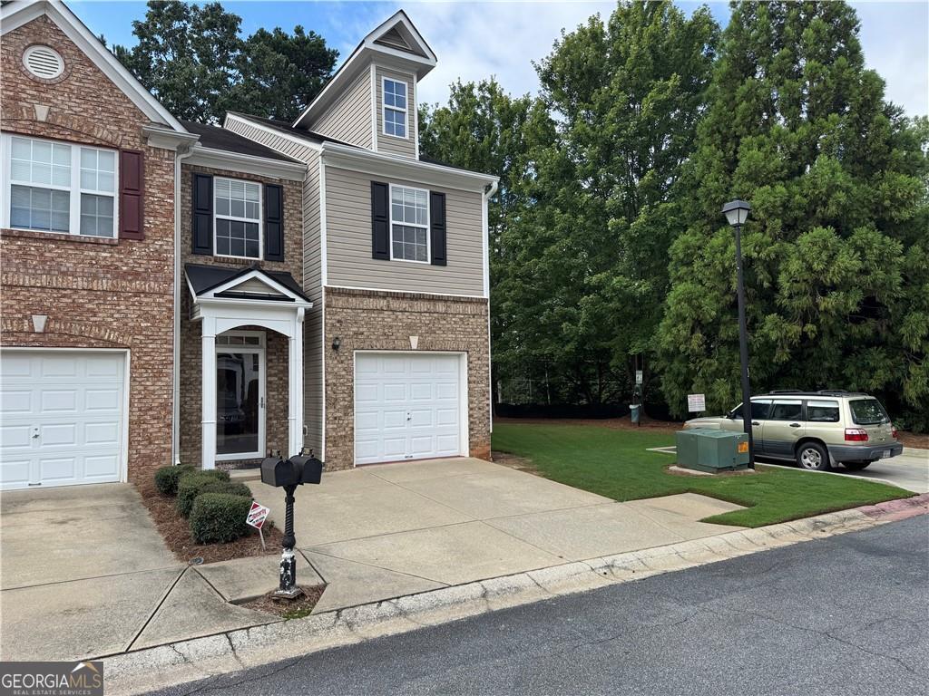 A bright, open floor plan greets you in this meticulously maintained home, nestled in the highly coveted and award-winning Peachtree Ridge School District! The kitchen boasts a large island and effortlessly connects to the dining and family rooms, making it ideal for both everyday living and entertaining. Step outside to a private backyard, perfect for relaxation or gatherings. Two generously sized master suites provide the ultimate in comfort and privacy. An unbeatable location, just 1 mile from I-85 and minutes from shopping, dining, and entertainment.