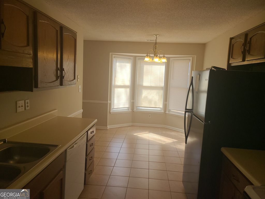 Photo of 8010 Woodlake Drive, Riverdale, GA 30274 (MLS # 10741683)