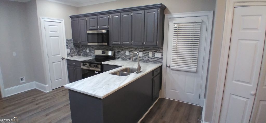 Photo of 2904 Chesterfield Way SE, Conyers, GA 30013 (MLS # 10659861)