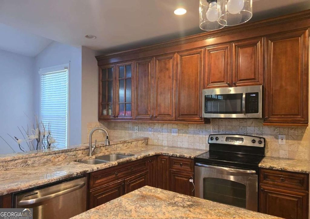 Photo of 232 Spalding Gates Drive, Atlanta, GA 30328 (MLS # 10694112)