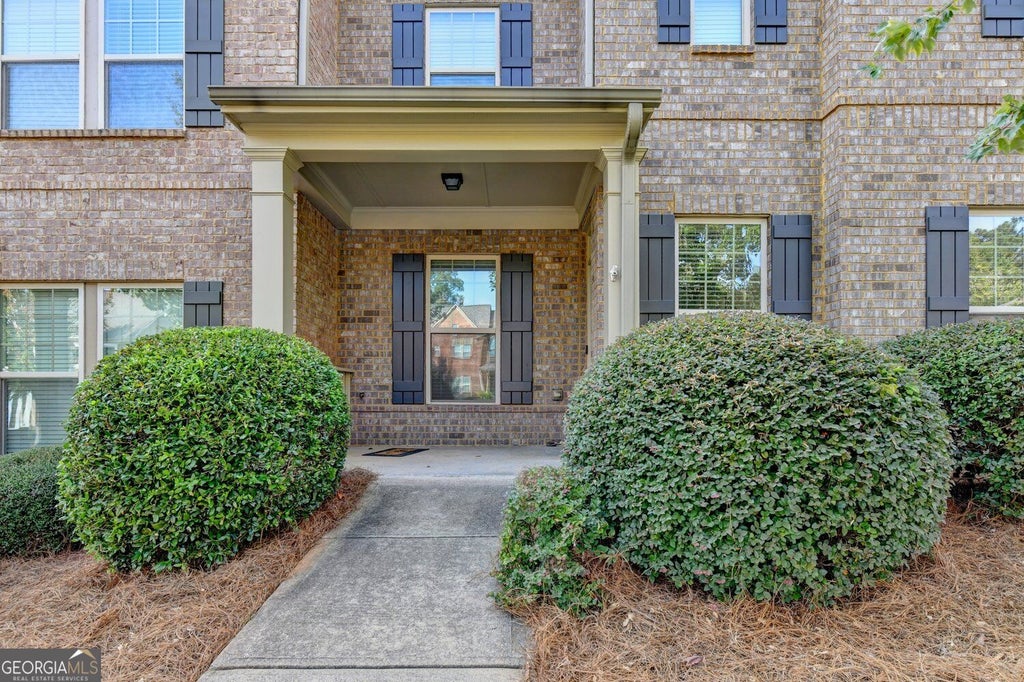 Photo of 1285 Woodmore Way, Alpharetta, GA 30004 (MLS # 10851221)