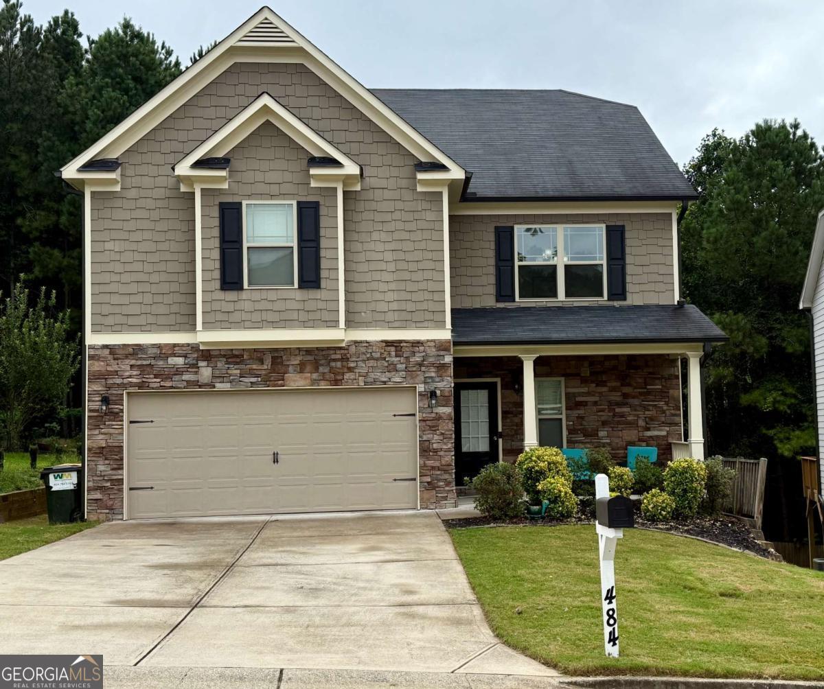 Stunning 5 Bedroom Home with Finished Basement in Canton! Welcome to this beautiful 5 bedroom, 3.5 bath home that's only 7 years old and move-in ready! From the moment you pull up, you'll notice the charming curb appeal with stone accents, a welcoming front porch, and a private wooded backdrop. Inside, you'll find an open and functional floor plan designed for modern living. The spacious kitchen flows into the family room, perfect for entertaining and everyday life. Upstairs, the primary suite offers a peaceful retreat with a spa-like bath, while additional bedrooms provide plenty of space for family, guests, or a home office. The completely finished basement is a true bonus-ideal for a media room, gym, or even a second living space. Outdoors, enjoy your private backyard with room to relax and play. Located in a desirable community, close to shopping, dining, and top schools, this home truly has it all.