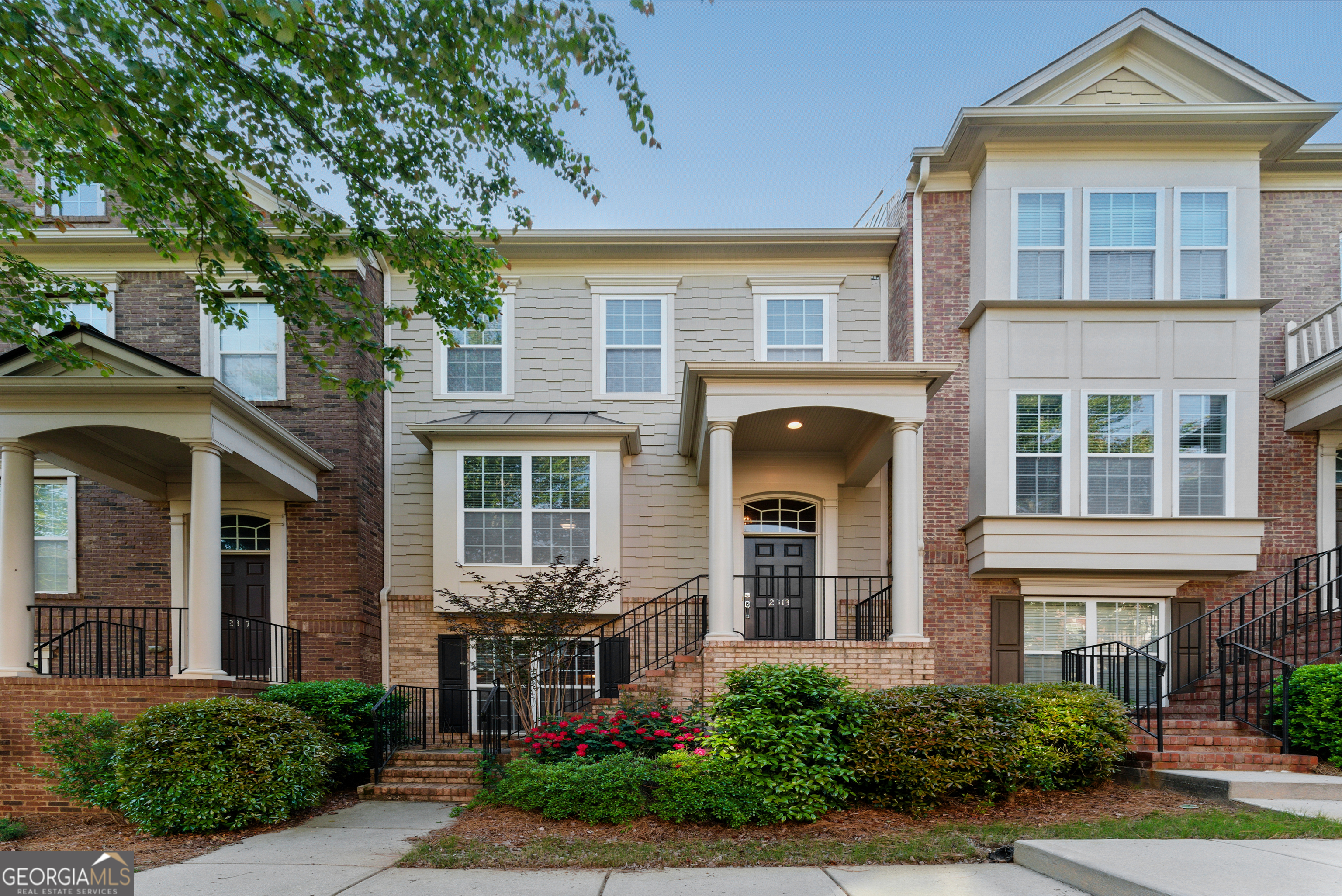 Turnkey modern smart home tech with fully upgraded hardwood flooring and paint surrounded by a meticulously landscaped front yard and warm scenic views of the tree-lined street and lush yards where suburban tranquility meets urban convenience to enjoy the unparalleled Smyrna lifestyle. A sun-drenched living room featuring gleaming hardwood floors and a cozy fireplace, a chef-inspired kitchen beautifully updated with granite countertops, stainless steel appliances, and ample cabinetry with additional space for dining and a walk-in pantry. Upstairs, 2 spacious bedrooms include a primary suite with a spa-like bath with heated floors and a custom closet system. A new deck or swim in the pool! Convenient guest parking right outside your door with 2-car garage. Minutes from the Silver Comet Trail, I-285 access, and Smyrna Market Village are 0.5 miles