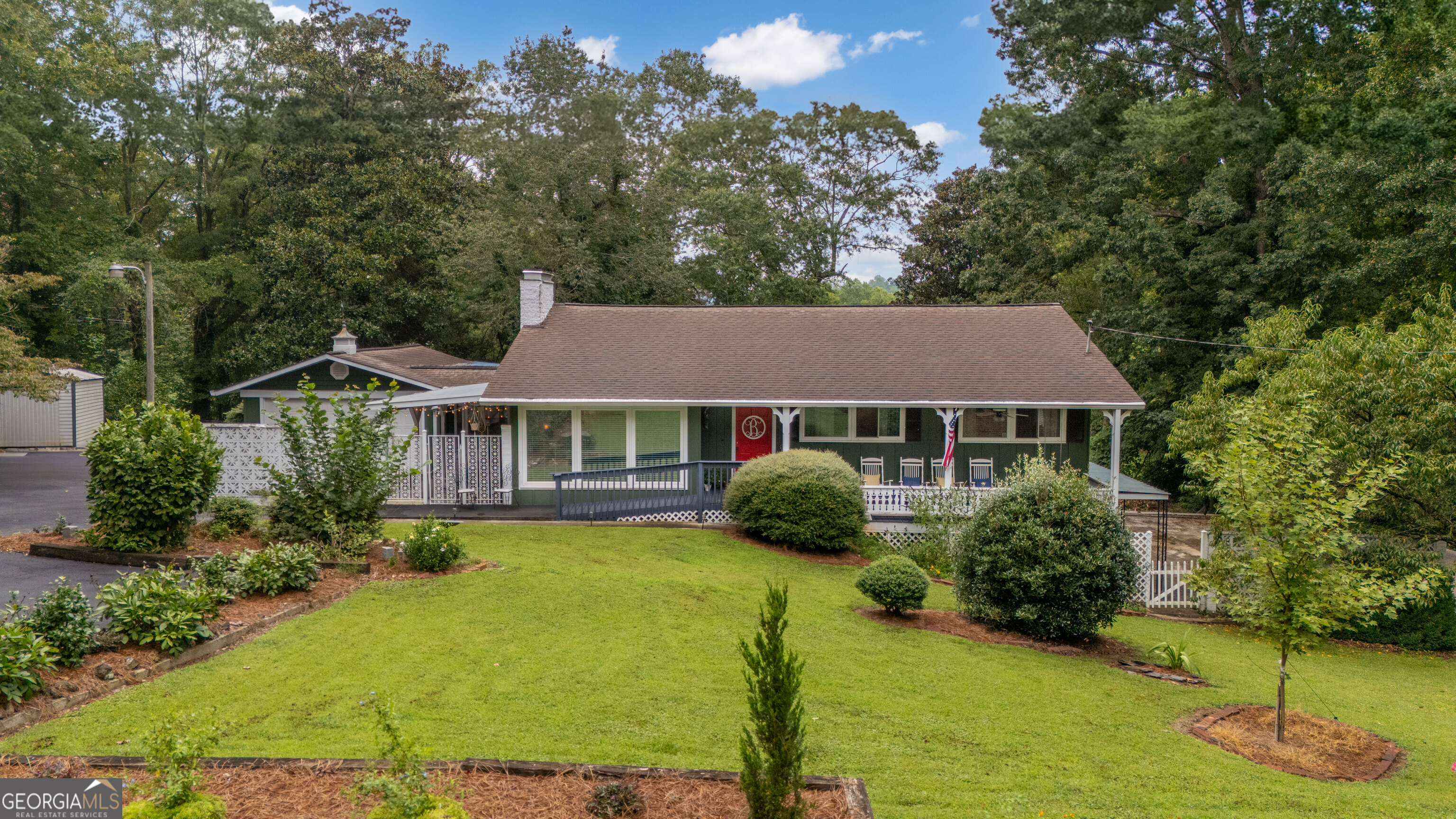 Welcome to this beautifully updated 4-bedroom, 3-bathroom home offering over 3,000 sq ft of thoughtfully designed living space-priced at just $130 per sq ft! Located in a quiet, established neighborhood just a 3-minute walk from the heart of Clarkesville Square, this home blends modern updates with timeless comfort. Step inside to discover newly remodeled bathrooms, energy-efficient windows, and gleaming oak flooring throughout the upstairs. The kitchen and upstairs bathrooms feature stylish new tile, and the entire home was professionally painted in 2023. Cozy up to natural gas logs upstairs. Basement includes luxury vinyl plank (LVP) flooring, a full bath, and a fully functioning wine bar-perfect for entertaining. Enjoy the peace of mind that comes with a whole-home standby natural gas generator, a 2022 electric HVAC unit, natural gas heating, updated plumbing (copper/PVC), and a lifetime transferable waterproofing bond. Outdoor living is just as impressive with four covered porches/patios, a garage, a work shed, and professionally installed new gutters with a leaf guard system (2022). The property sits on over half an acre and is golf-cart friendly, making neighborhood living both fun and convenient. Extras include a washer/dryer, a 32-gun safe, city water/sewage/trash (avg. $70/month), gigabit internet availability, and a new stainless steel dishwasher (2025). Located just 5 minutes from all local schools, this home is the perfect mix of comfort, convenience, and value. Don't miss this rare opportunity in one of Clarkesville's most desirable areas!