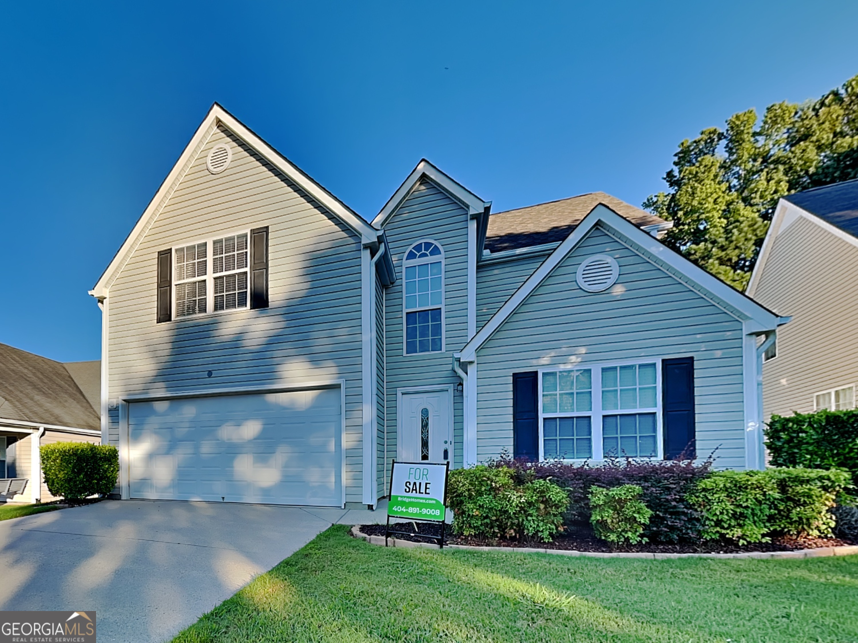Hot New Listing in Shadowbrooke! 3BD/2.5BA Stunner in Loganville - Packed with Upgrades! Welcome to 415 Shadowbrooke Circle, where style meets function in this 2,132 sq ft two-story gem in the sought-after Shadowbrooke subdivision of Gwinnett County! This high-impact 3 bed / 2.5 bath home is designed to impress with modern finishes, a smart layout, and entertainment-ready spaces from top to bottom! Step inside to a dramatic double foyer, setting the tone for this home's spacious, open flow. The main level features warm laminate flooring, a large family room with cozy fireplace, and 7 recessed ceiling lights to set the perfect mood. Above the fireplace, a custom display shelf adds a stylish focal point. Love to cook or entertain? The open-concept kitchen is ready for action-featuring abundant cabinet and counter space, sleek stainless steel appliances including a double-sided refrigerator with icemaker, ceramic cooktop stove, dishwasher, microwave, and a built-in under-cabinet wine cooler. Enjoy the walk-in pantry and breakfast bar lit by designer pendant and recessed lighting-this kitchen is a true showstopper! The private fenced-in backyard is just off the living room-perfect for entertaining, grilling, or relaxing on the patio after a long day. There's plenty of space for hosting guests or playing with pets. Formal dining plans? The separate dining room is ideal for celebrations and holiday meals. A 2-car garage with storage keeps you organized, and the upstairs laundry room with built-in shelving makes everyday tasks convenient. Upstairs, the spacious primary suite boasts double walk-in closets, a luxurious ensuite bath with double vanity, soaking tub, separate shower, and a large window to soak in the sunlight. Added perks: paneled interior doors, stylish lighting throughout, and thoughtful design details that make this home truly stand out. Zoned for award-winning Gwinnett County Schools: Trip Elementary Bay Creek Middle Grayson High School Prime location in Loganville, close to parks, shops, dining, and top-rated schools. Don't miss your chance at this beautifully upgraded home!