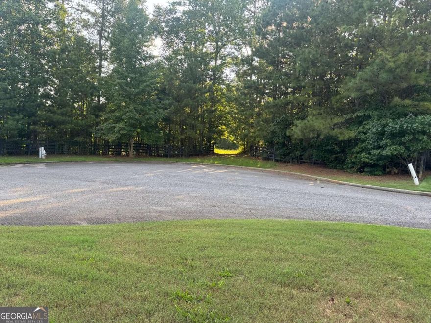 Luxury Custom Home Lot - Incredible opportunity to build your luxury dream home on 2+ acres or 6.52 acres (121, 124, & 126 Aaronwood Ct) in one of Alpharetta's most desirable and private cul-de-sac locations. Nestled among mature hardwoods and natural landscape, this gently rolling lot offers the perfect canvas for a high-end custom estate with endless possibilities-whether you envision a sprawling modern farmhouse, a timeless Southern retreat, or a transitional masterpiece with resort-style outdoor living. With no HOA, you'll enjoy full creative freedom to bring your architectural vision to life-add a pool, outdoor kitchen, guest house, or design for multigenerational living. The lot provides space, privacy, and flexibility rarely found in such a prime location.  Conveniently located just minutes from Downtown Alpharetta, Milton, Avalon, top-rated schools, and GA-400, this exceptional property blends the serenity of estate living with unmatched access to dining, shopping, and major commuter routes.  Don't miss this rare opportunity to own and build in North Fulton County. Whether you're a buyer looking to create a forever home or a builder seeking a prime homesite, Aaron Wood Ct is ready to bring your vision to life.  Total land frontage for the land totals 164 Feet or lot average is . The parcels can be sold individually or as an assemblage of 6.52 acres.  The property is in a subdivision where the last home sold for over $900K on a lot of 2.14 acres. Each lot has a different parcel number and legal description.  Lot 6: 2.23 Acres 02N12 100; Lot 7: 2.15 Acres 02N12 101; Lot 8: 2.14 Acres 02N12 102