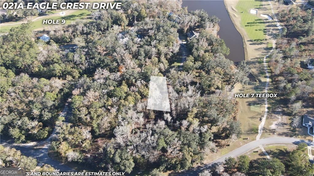 This spacious .23-acre lot is located within the prestigious gated community of Sanctuary Cove, offering the perfect opportunity to build your dream home in a serene, coastal setting. Surrounded by lush landscaping and thoughtfully designed homes, this homesite provides access to a wealth of resort-style amenities, including a community pool, fitness center, tennis and pickleball courts, a scenic day dock, walking trails, and a cozy firepit gathering area - all designed to support an active and relaxing lifestyle. Conveniently situated just off I-95, Sanctuary Cove offers easy access to some of the Southeast's most popular destinations. You'll be just 25 minutes from the beaches of St. Simons Island and downtown Brunswick, 40 minutes from Jacksonville International Airport, and about an hour from the charm and history of Savannah. Despite its ideal coastal location, this lot is located outside of high-risk flood zones - no flood insurance is required, offering both peace of mind and significant long-term savings. Whether you're ready to build now or planning for the future, this beautiful homesite offers the best of coastal Georgia living in a secure, amenity-rich community.
