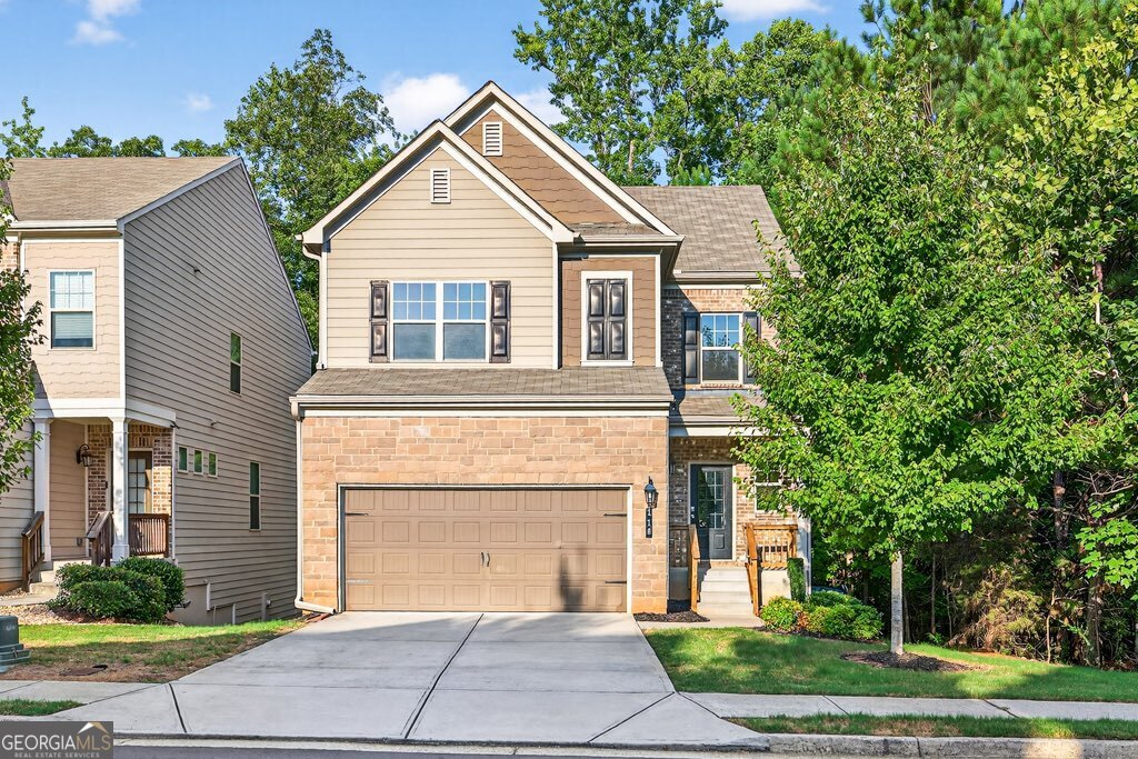 Open house Saturday July 26th from 11-1pm!! Step into a home that blends modern comfort with endless possibilities, including an unfinished basement ready for your dream expansion and a yard adorned with fruit trees. Featuring a spacious open floor plan on the main level, this home is ideal for modern living and effortless entertaining. The property includes an unfinished basement, providing endless potential for expansion, a custom retreat, or additional storage. Enjoy the beautifully landscaped yard complete with mature fruit trees, creating a peaceful and private outdoor haven. Residents of Springs at Rockhouse enjoy resort-style amenities, including a sparkling swimming pool, tennis courts, and a large clubhouse perfect for relaxing or hosting gatherings. Meticulously maintained by the current owner, this home is truly move-in ready. Conveniently situated just minutes from Highway 316 and downtown Lawrenceville, you'll have easy access to shops, dining, and all that Gwinnett County has to offer. Don't miss your opportunity to own a home in one of Lawrenceville's most vibrant and amenity-rich communities!
