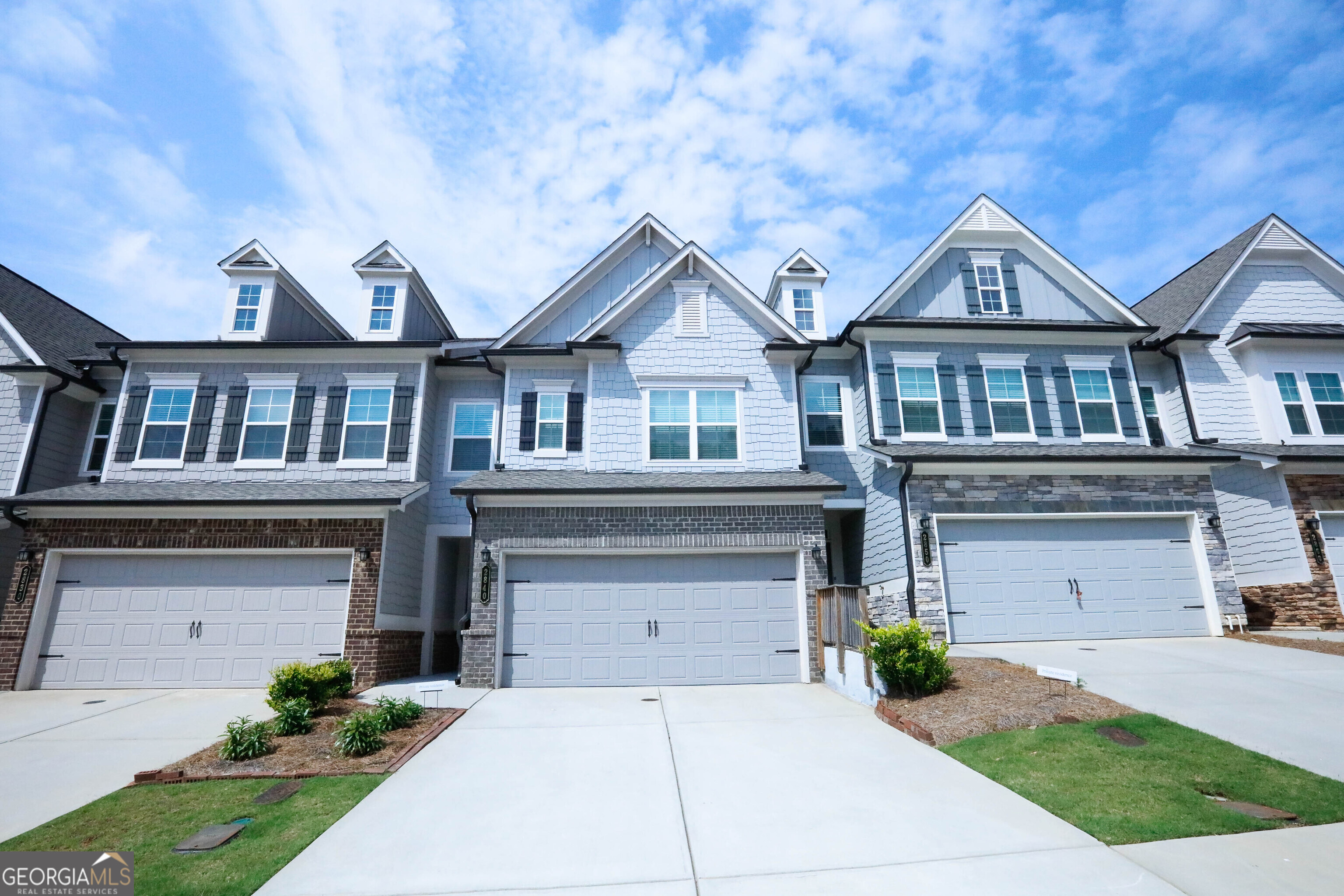 WOW!! Fabulous 3 bedroom/2.5 bath Townhome located in the Heart of Suwanee! Well-maintained and in excellent condition; built in 2022. Spacious 2-story floorplan with all Hardwood floors on Main level and in upstairs hall. Open concept floorplan with a large Great room and Dining area. Beautiful Kitchen includes an Oversized Island, White cabinets, Granite countertops, Tile backsplash, S/S appliances, and Pantry. Huge Master suite with Trey ceilings to include an ensuite with Double vanities, a separate Shower & Soaking tub, and a BIG walk-in closet. Two large secondary bedrooms upstairs. Very convenient location; within minutes to I-85. Close to shopping, resturants, and more!! Hurry!! Don't pass on this one!