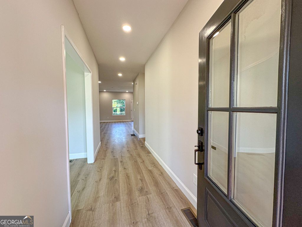 Photo of 5719 Calm Valley Point, Flowery Branch, GA 30542 (MLS # 10759046)