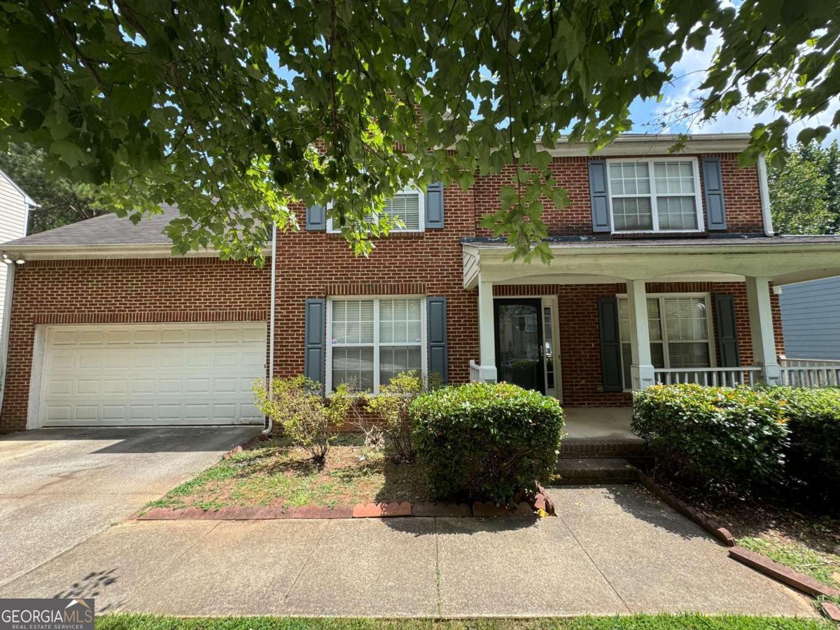 Lawrenceville New Listing!! Beautiful home w/ 4 bedrooms and semi-finished basement. Hardwood flooring @ front door, and spacious Family Room w/ beautiful fireplace. Kitchen has double sink w/garbage disposal, electric range/oven, built-in microwave, refrigerator, large pantry, eat-in area. All bedrooms upstairs. Master bedroom w/ deep trey ceiling & fan, large his & her walk-in closets. Master bath has dual vanities, garden tub, step-in shower. Elevated deck off kitchen, front porch. Laundry room upstairs.