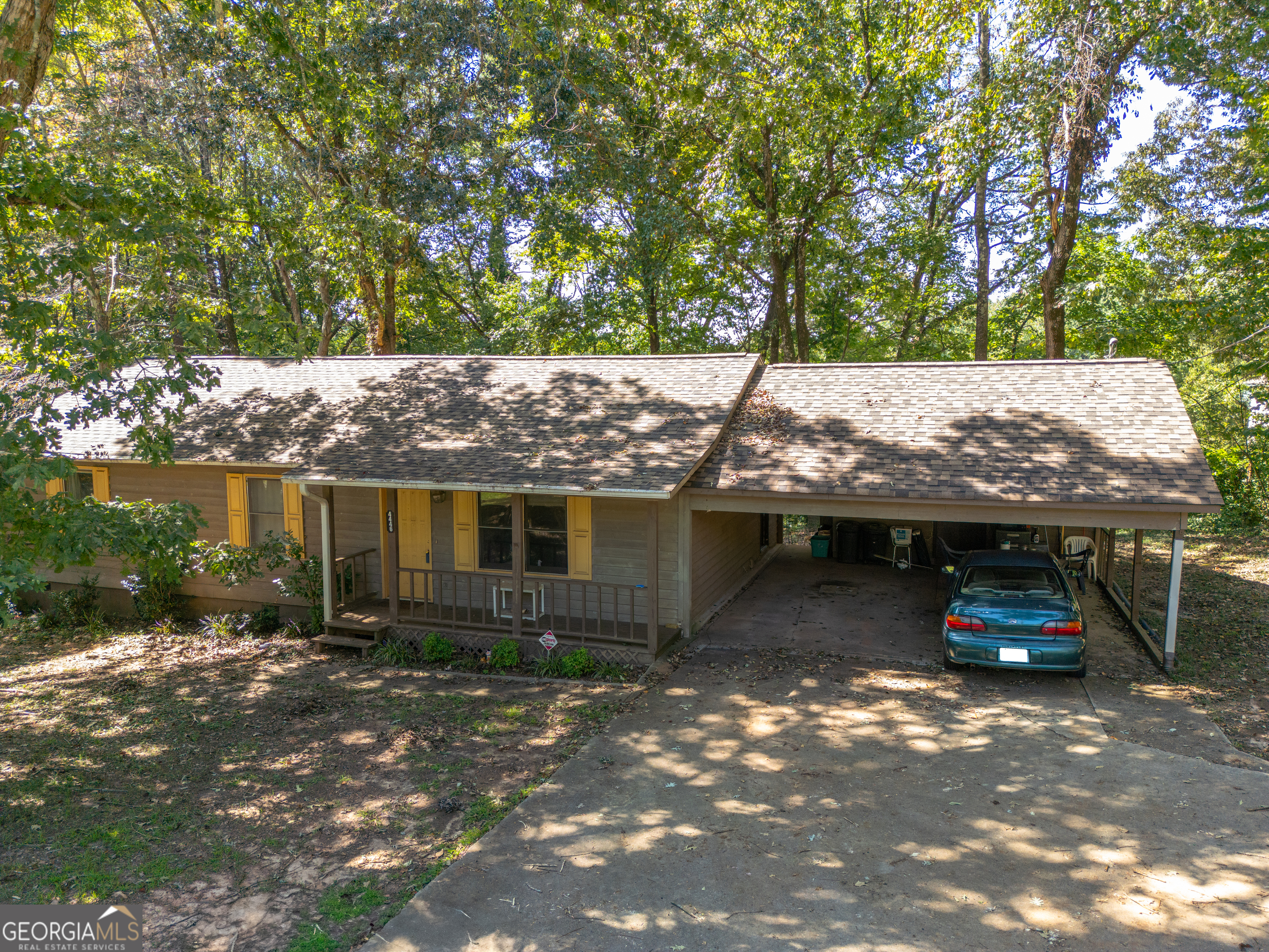 BRAND NEW ROOF! LOCATION LOCATION, EASY COMMUNTE! Located in the tranquil Flowery Branch, GA, this inviting 3-bedroom, 2-bathroom home is a blend of comfort and convenience, making it a perfect opportunity for your next home or investment property. An open-plan layout and spacious bedrooms, define this residence. The yard offers a serene outdoor escape with a back deck. Its superb location is enhanced by proximity to the University of North Georgia, local menities, parks, and schools, ensuring a blend of academic and lifestyle convenience. With central heating and air, hot water heater replaced in 2022, and septic tank just serviced in Nov. 2023, this property is ready for you to make it your home!