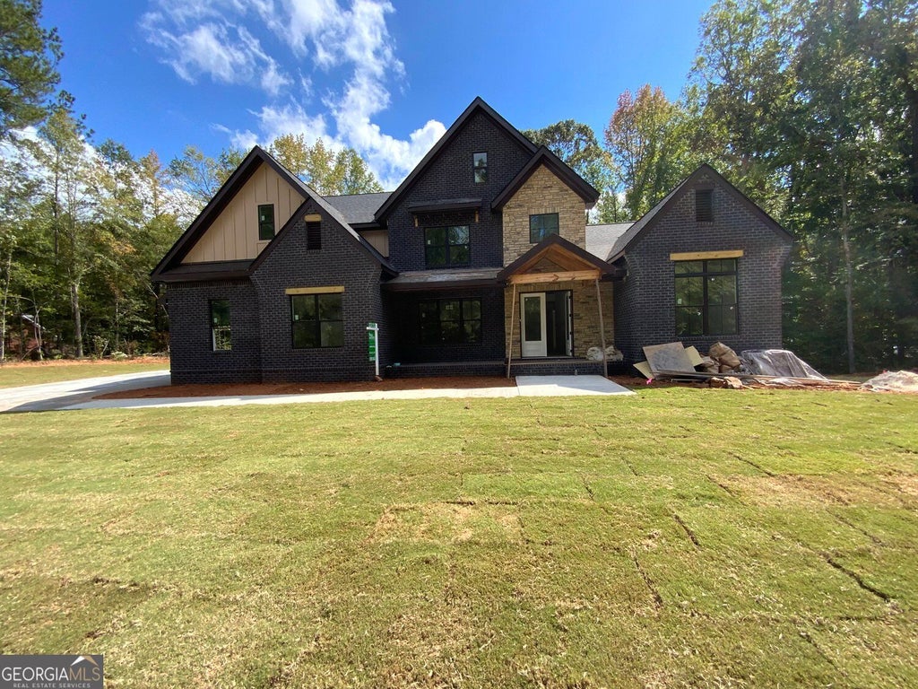Photo of 2318 Smyrna Road SW, Conyers, GA 30094 (MLS # 10877135)
