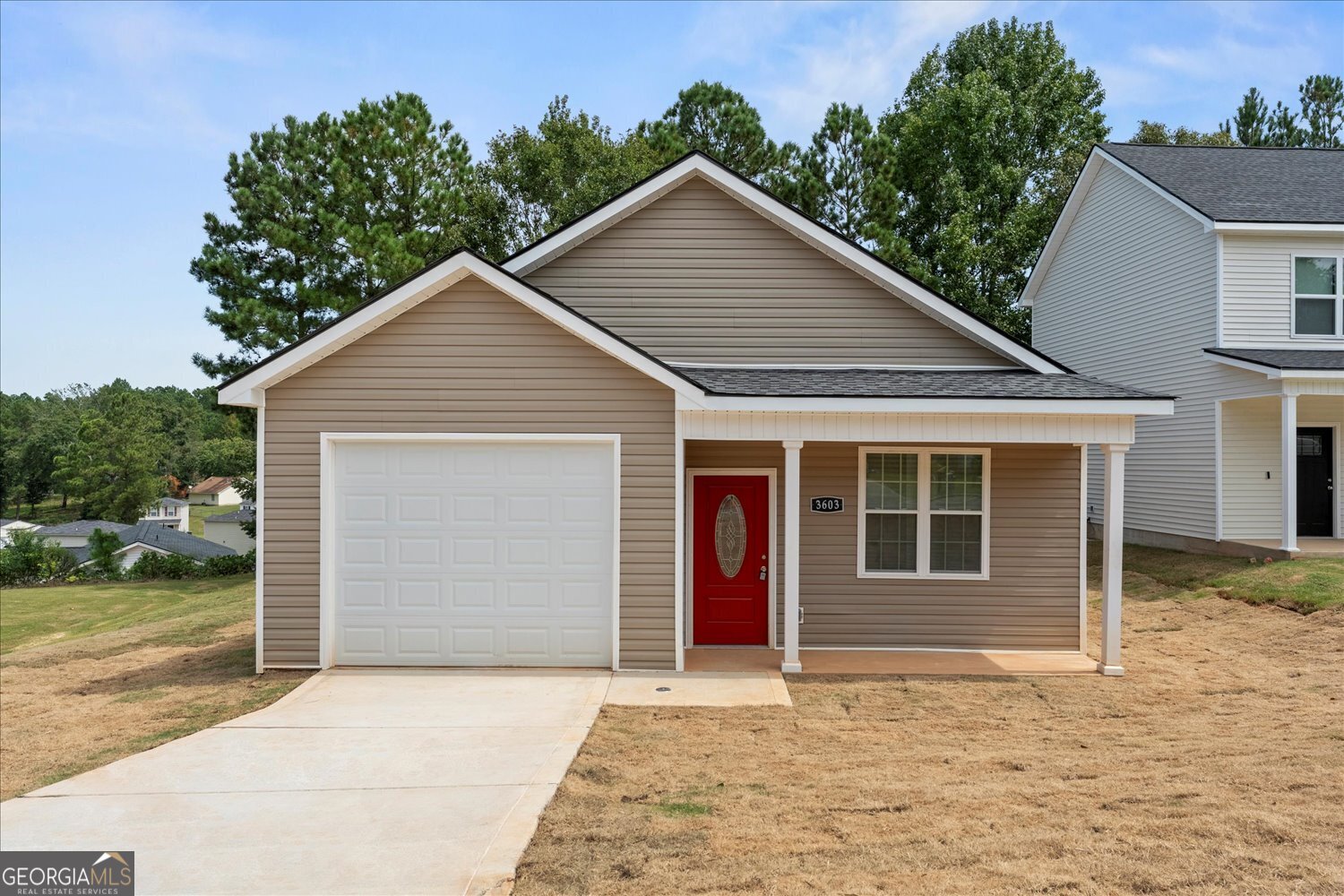 Step into this beautifully designed new construction home featuring an open-concept floor, spacious kitchen with granite countertops, island, and stainless steel appliances including the range, microwave, dishwasher, and refrigerator. The layout offers two secondary bedrooms with a conveniently located hall bath, while the primary suite provides the perfect retreat with a tiled shower, double vanities, and a walk-in closet. Whether you're hosting or enjoying quiet evenings at home, this property combines comfort, style, and functionality-all in a brand-new build! Seller is a licensed real estate agent in the state of GA.
